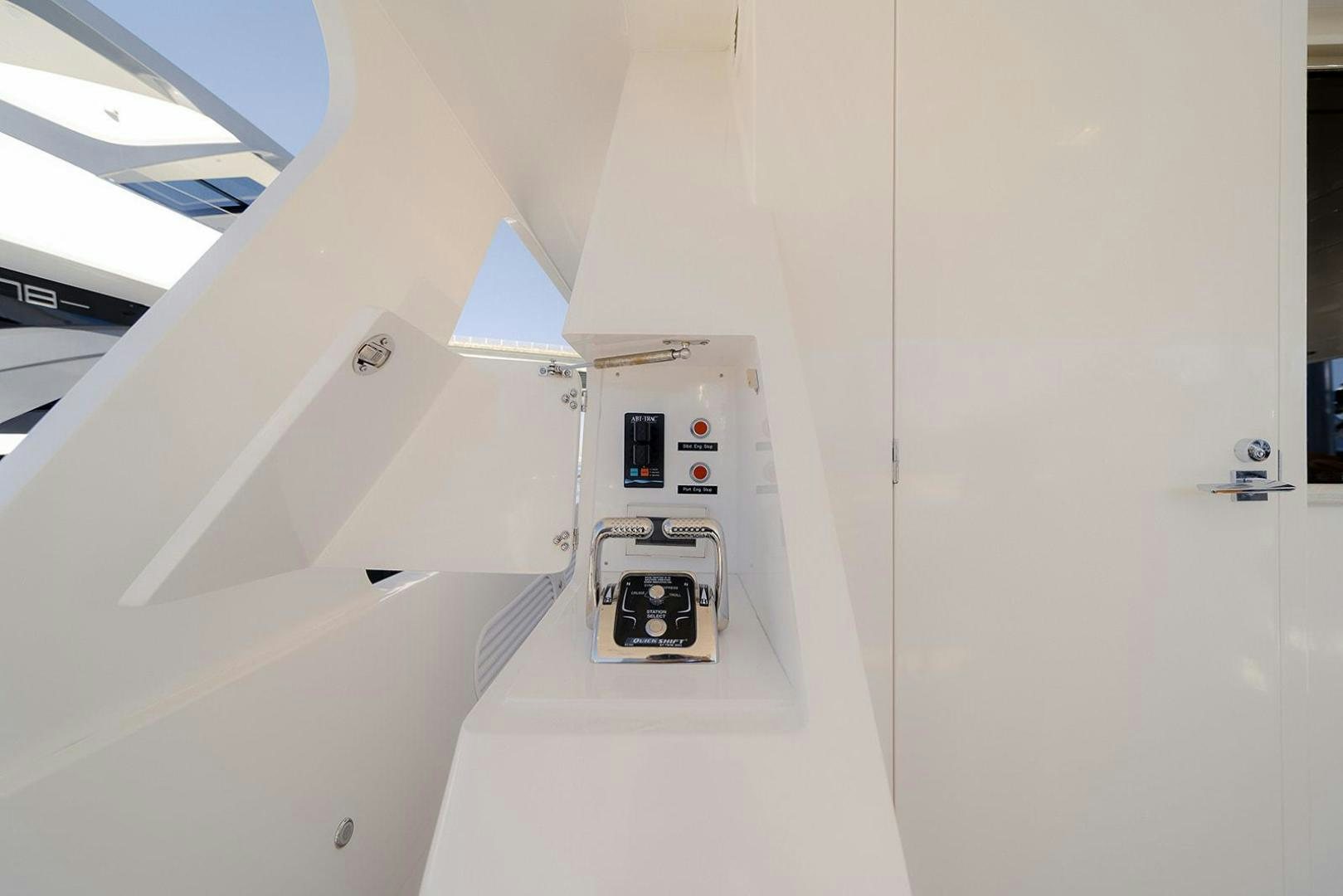 a white paneled wall with a computer on it aboard PARADISE Yacht for Sale