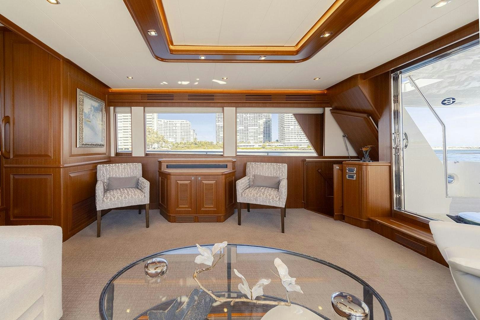 a large living room with a large rug aboard PARADISE Yacht for Sale