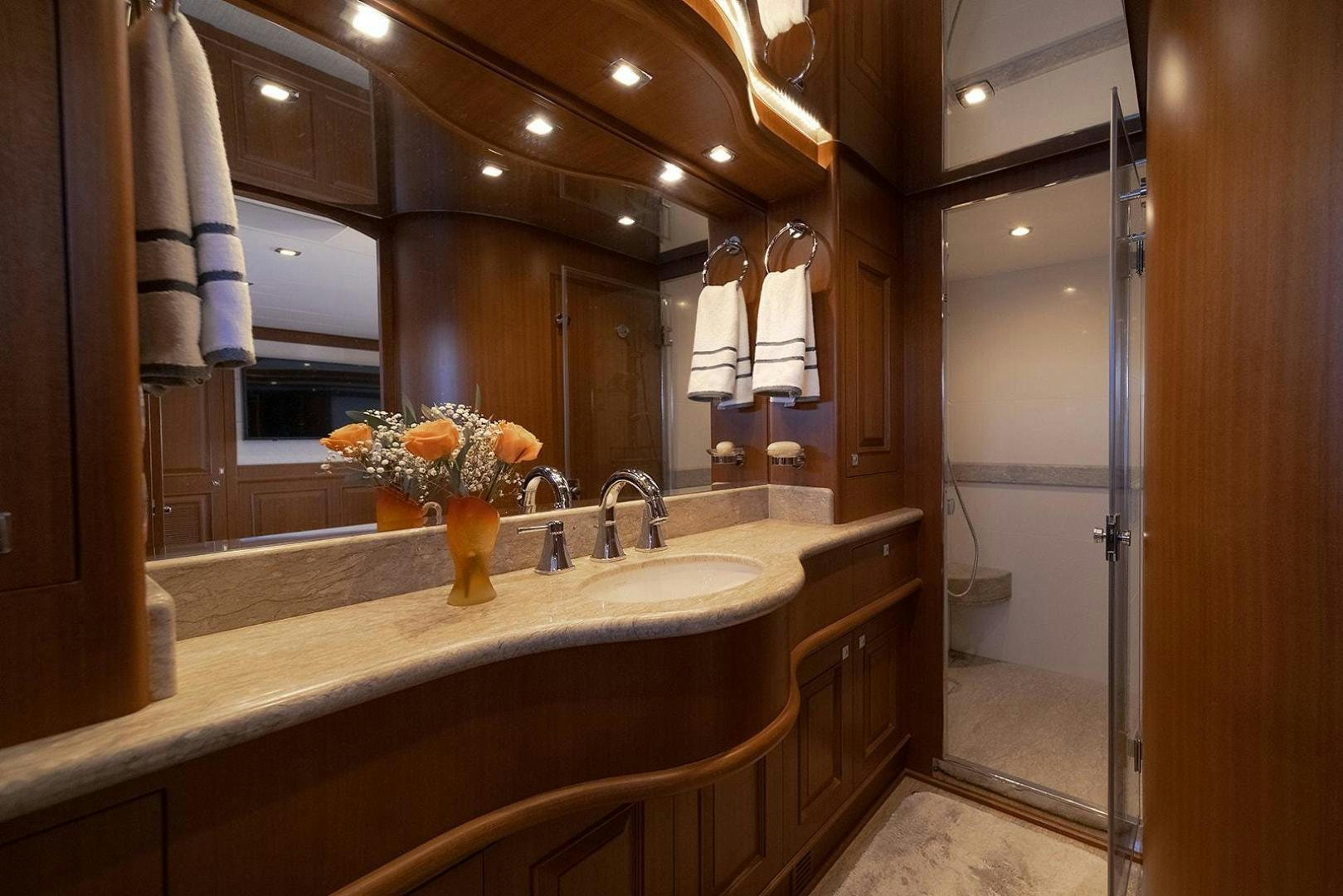 a bathroom with a large mirror aboard PARADISE Yacht for Sale