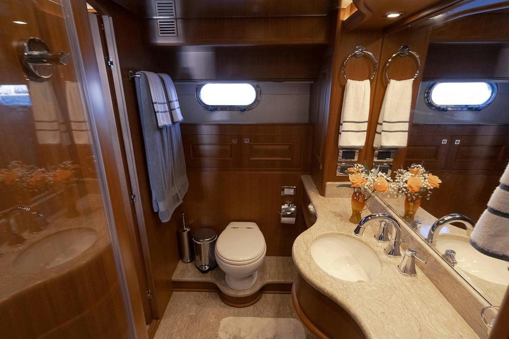 a bathroom with a sink and a toilet aboard PARADISE Yacht for Sale