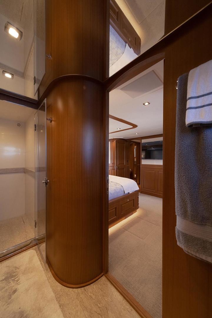 a large wooden door in a room aboard PARADISE Yacht for Sale