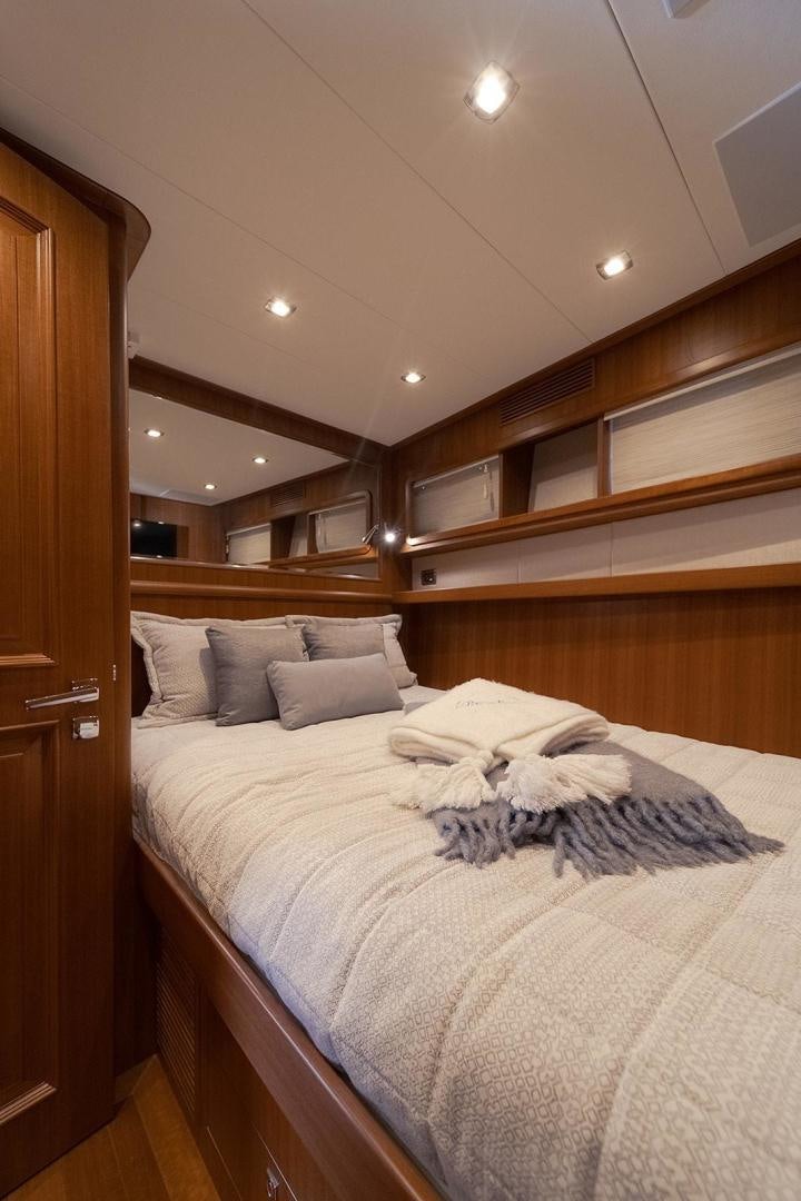 a bed in a room aboard PARADISE Yacht for Sale