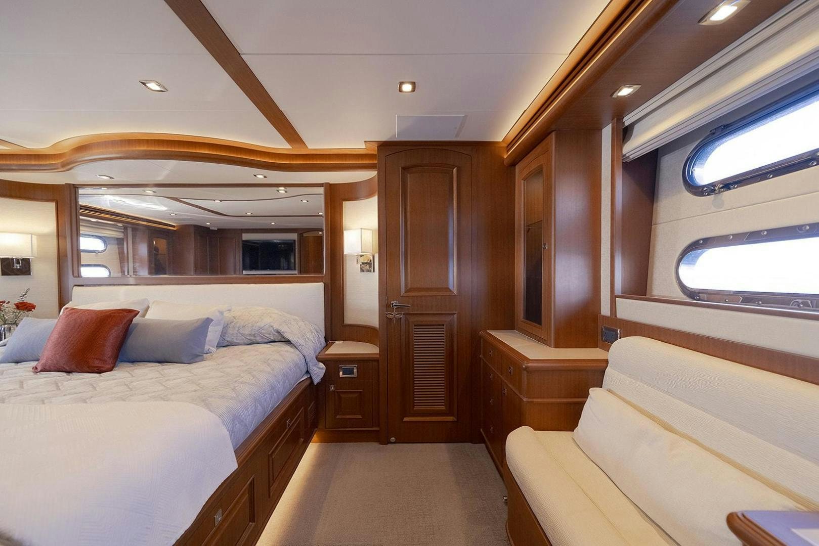 a room with a bed and a door aboard PARADISE Yacht for Sale