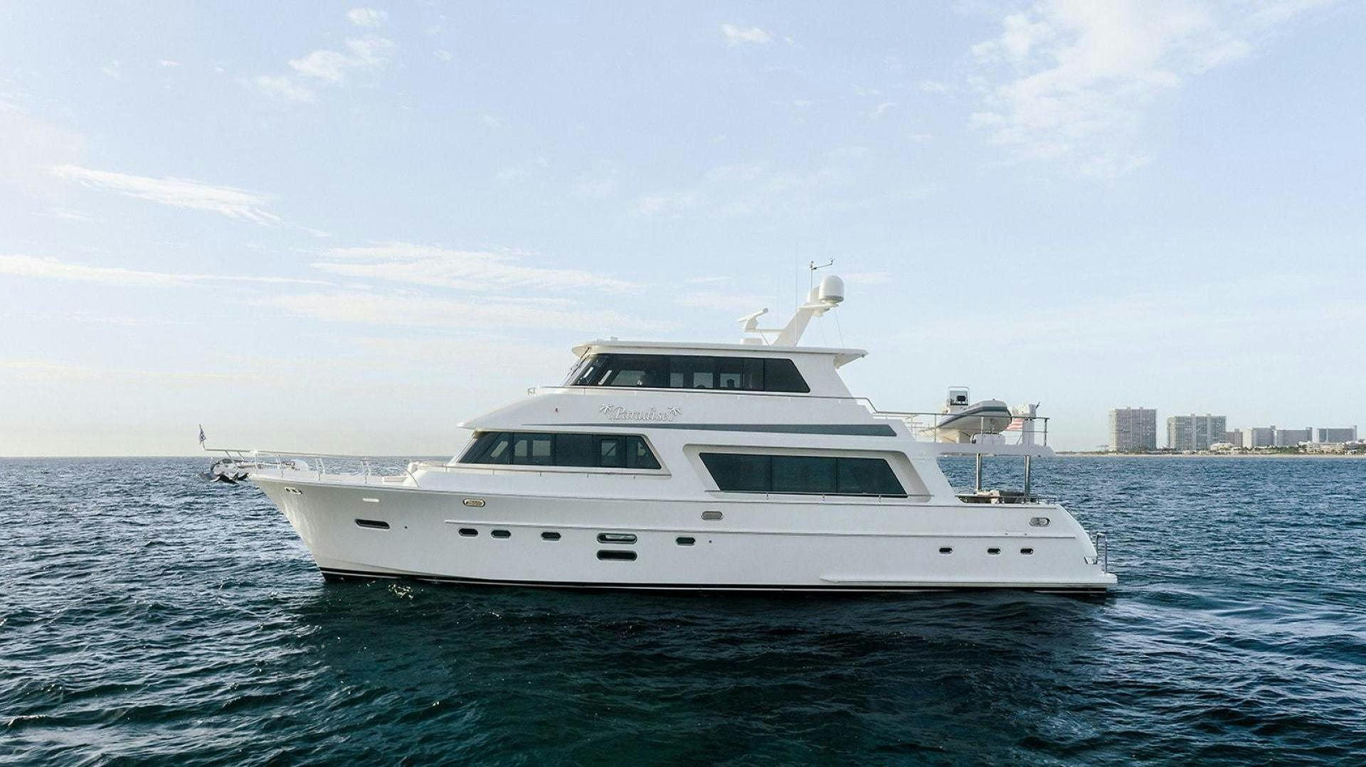 a white yacht in the water aboard PARADISE Yacht for Sale