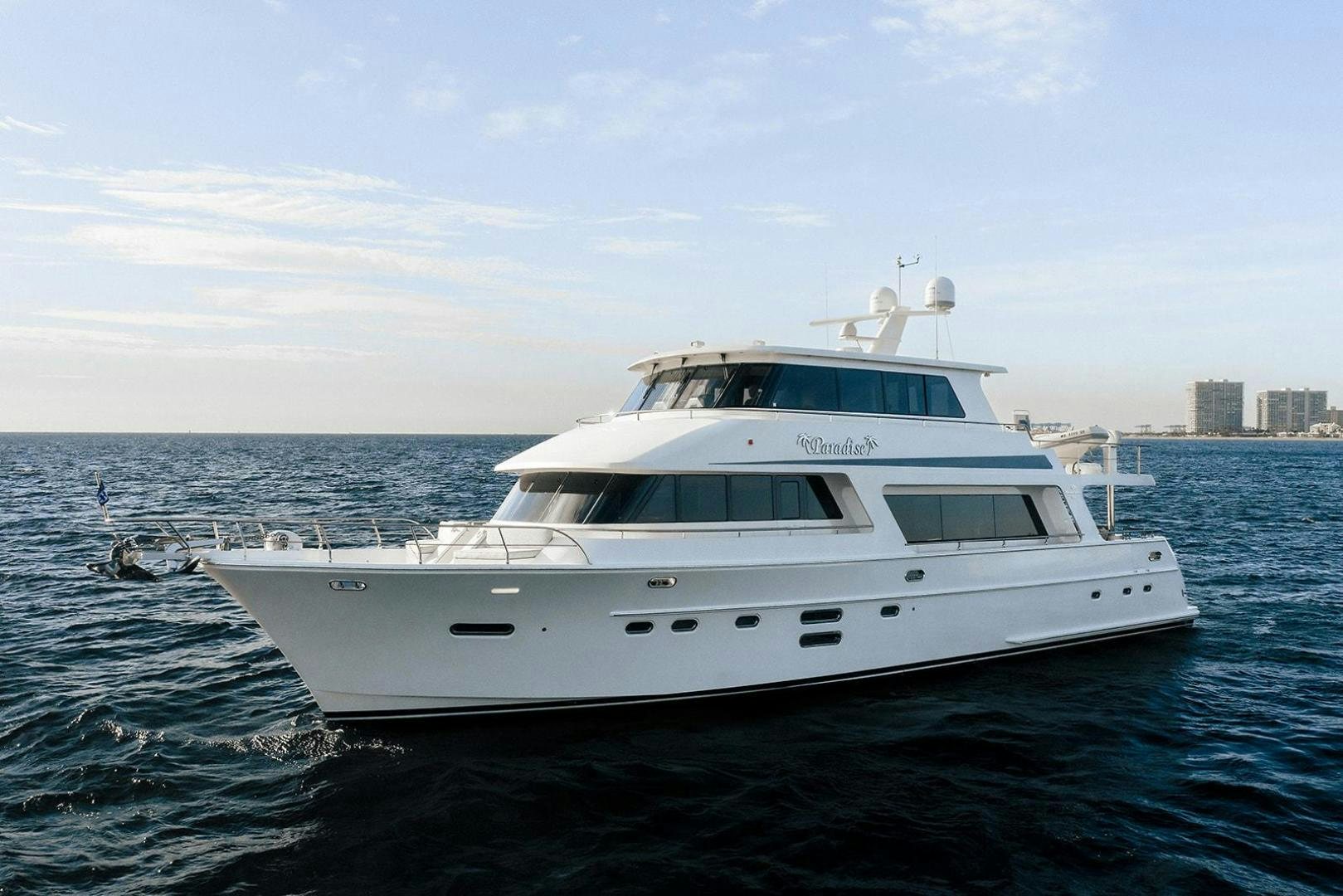 a white yacht in the water aboard PARADISE Yacht for Sale