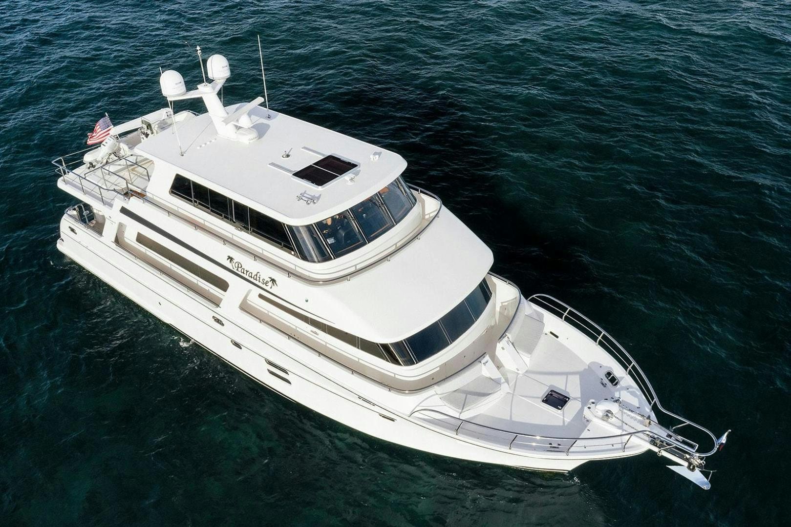 a white boat in the water aboard PARADISE Yacht for Sale