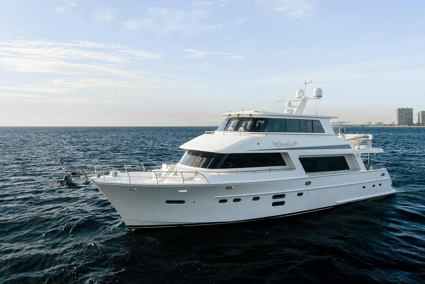 a white yacht in the water aboard PARADISE Yacht for Sale