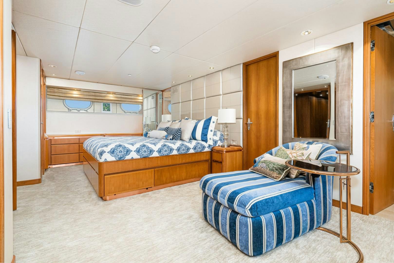 a bedroom with two beds aboard AFTERGLOW Yacht for Sale