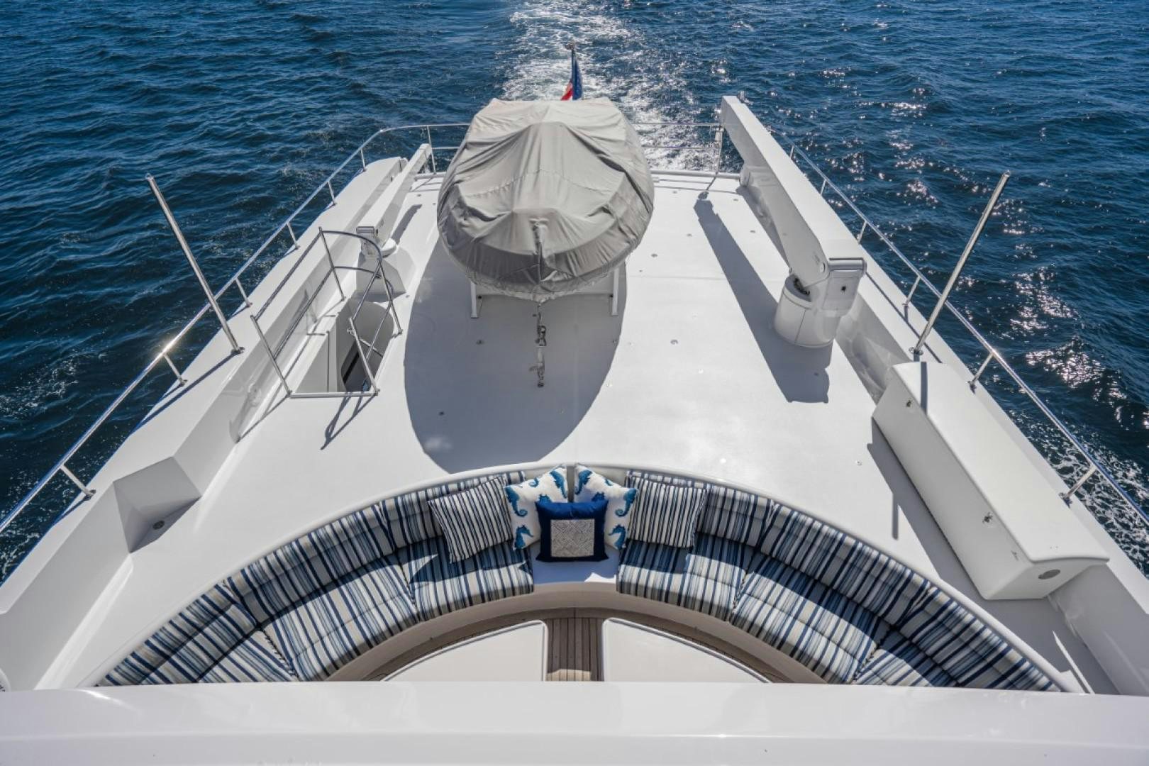 a white boat on the water aboard AFTERGLOW Yacht for Sale
