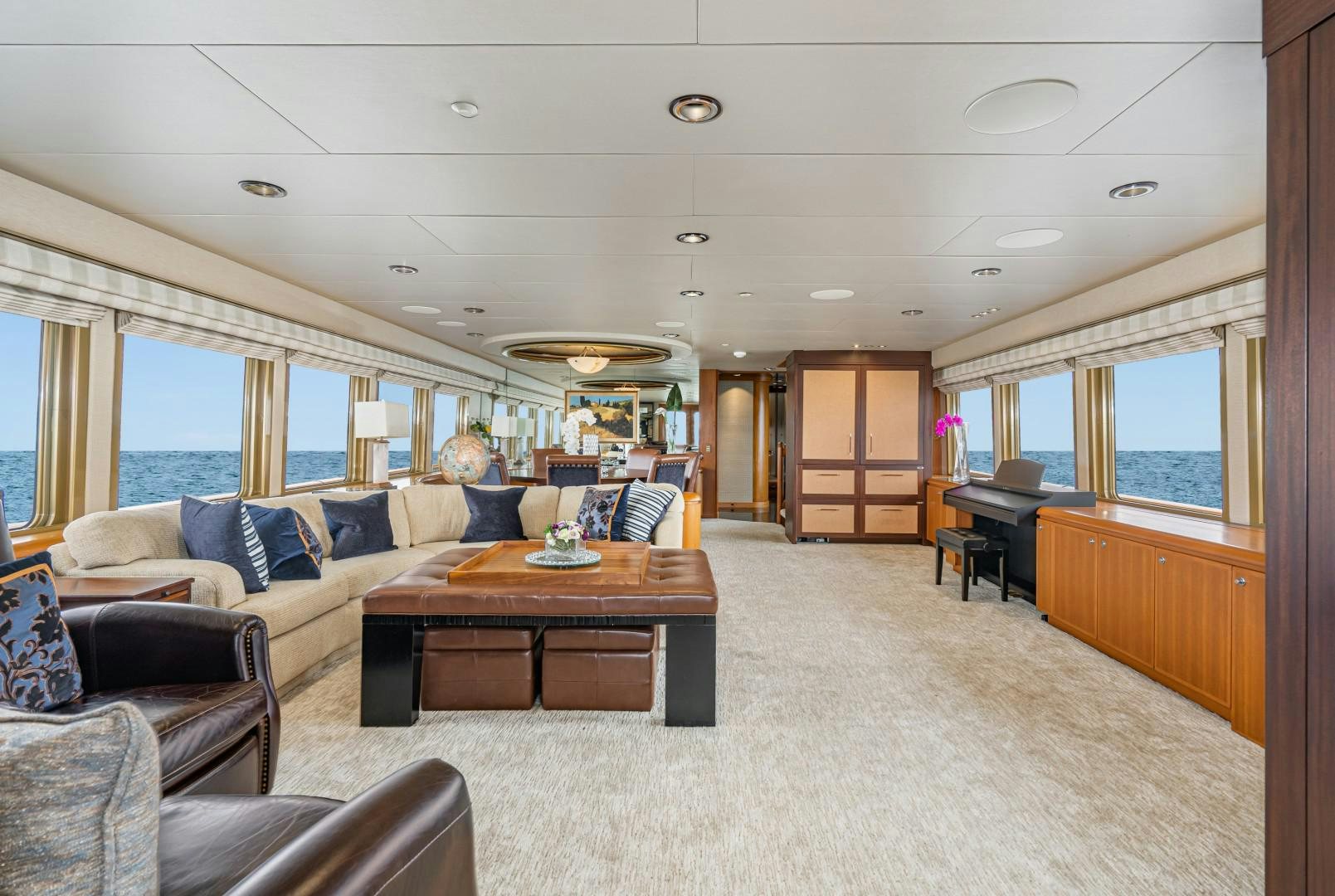 a living room with a large window aboard AFTERGLOW Yacht for Sale