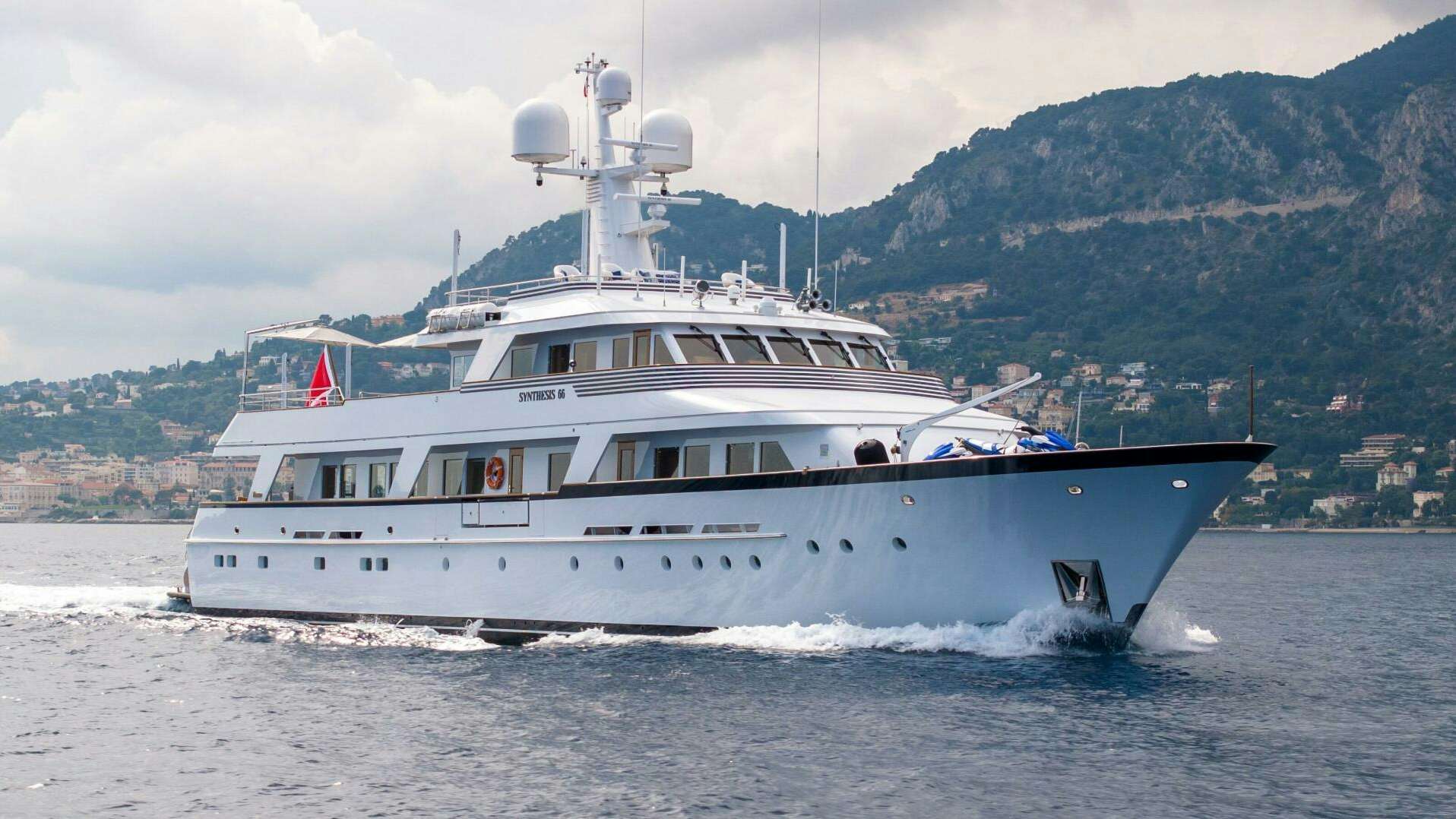 a boat on the water aboard Synthesis 66 Yacht for Sale