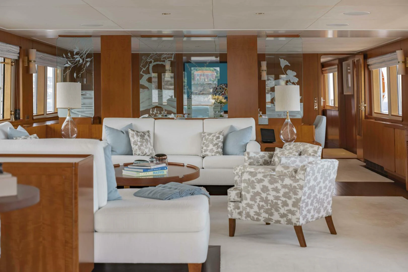a living room with a white couch aboard SYNTHESIS 66 Yacht for Sale