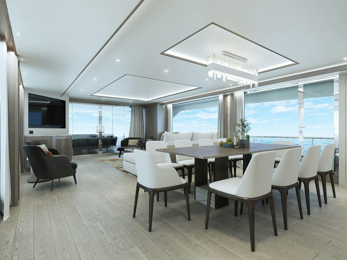 a room with a table and chairs aboard FD90 229 Yacht for Sale