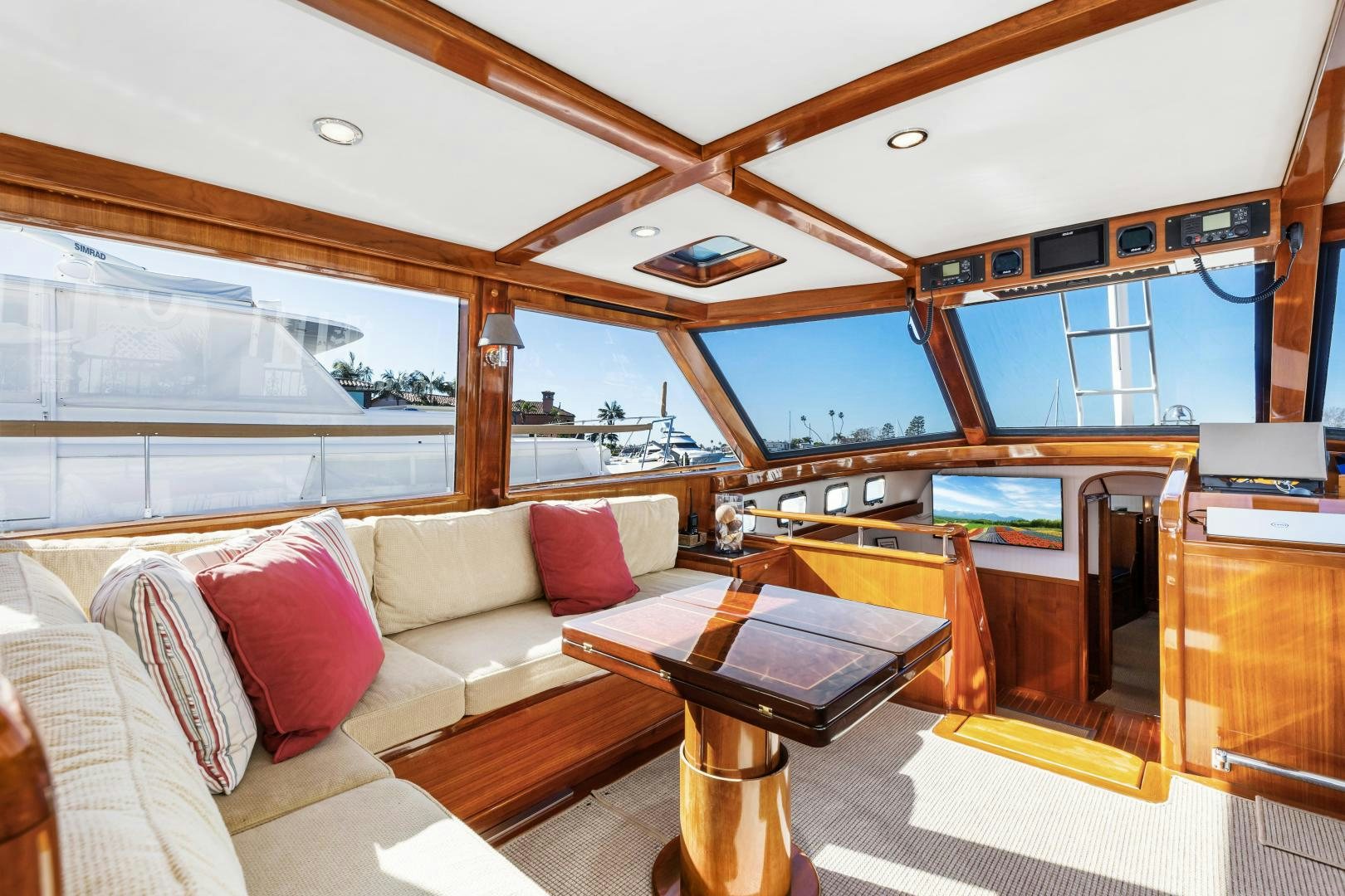 a living room with a large window aboard SILVER OAK Yacht for Sale