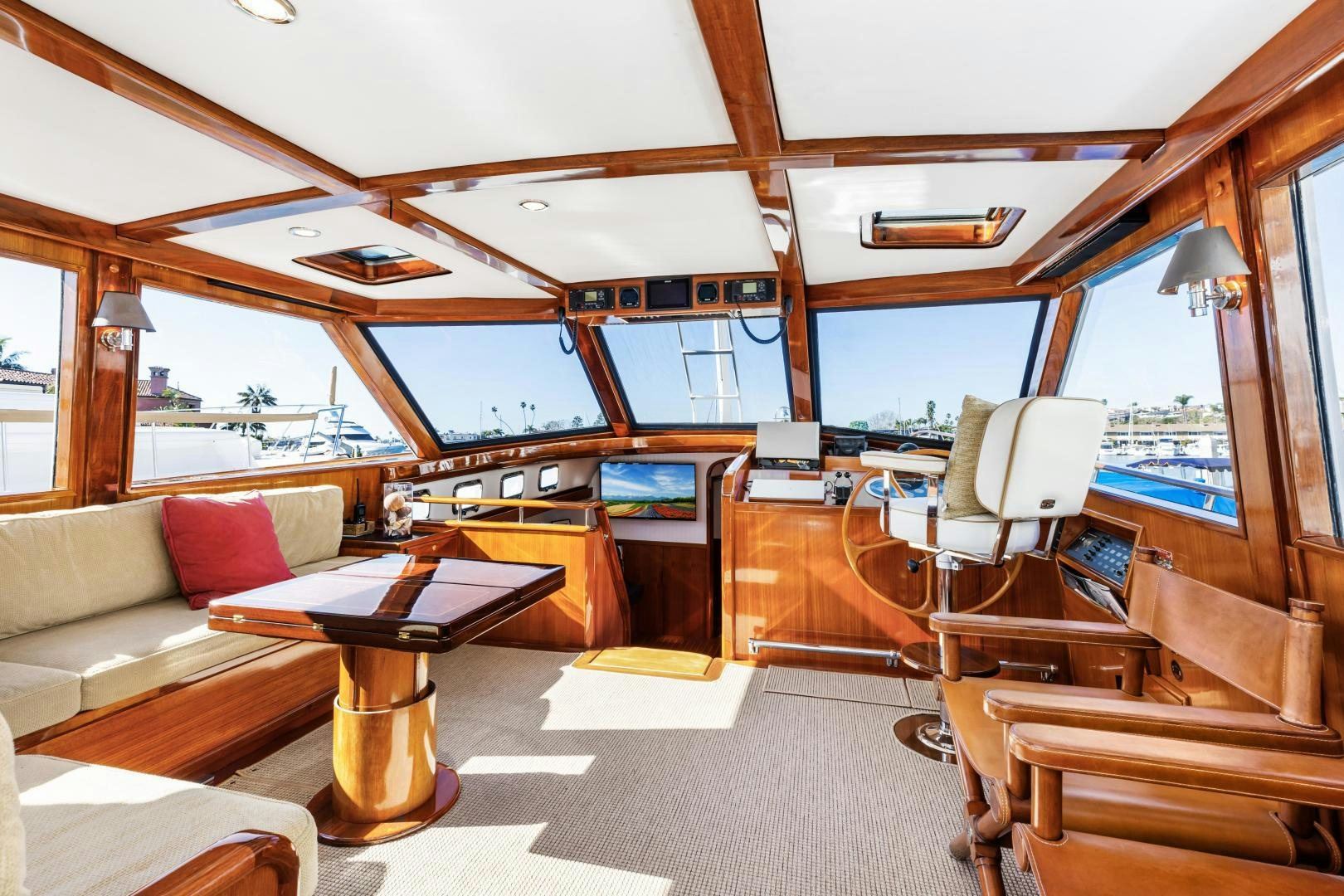 a boat with a desk and a couch aboard SILVER OAK Yacht for Sale