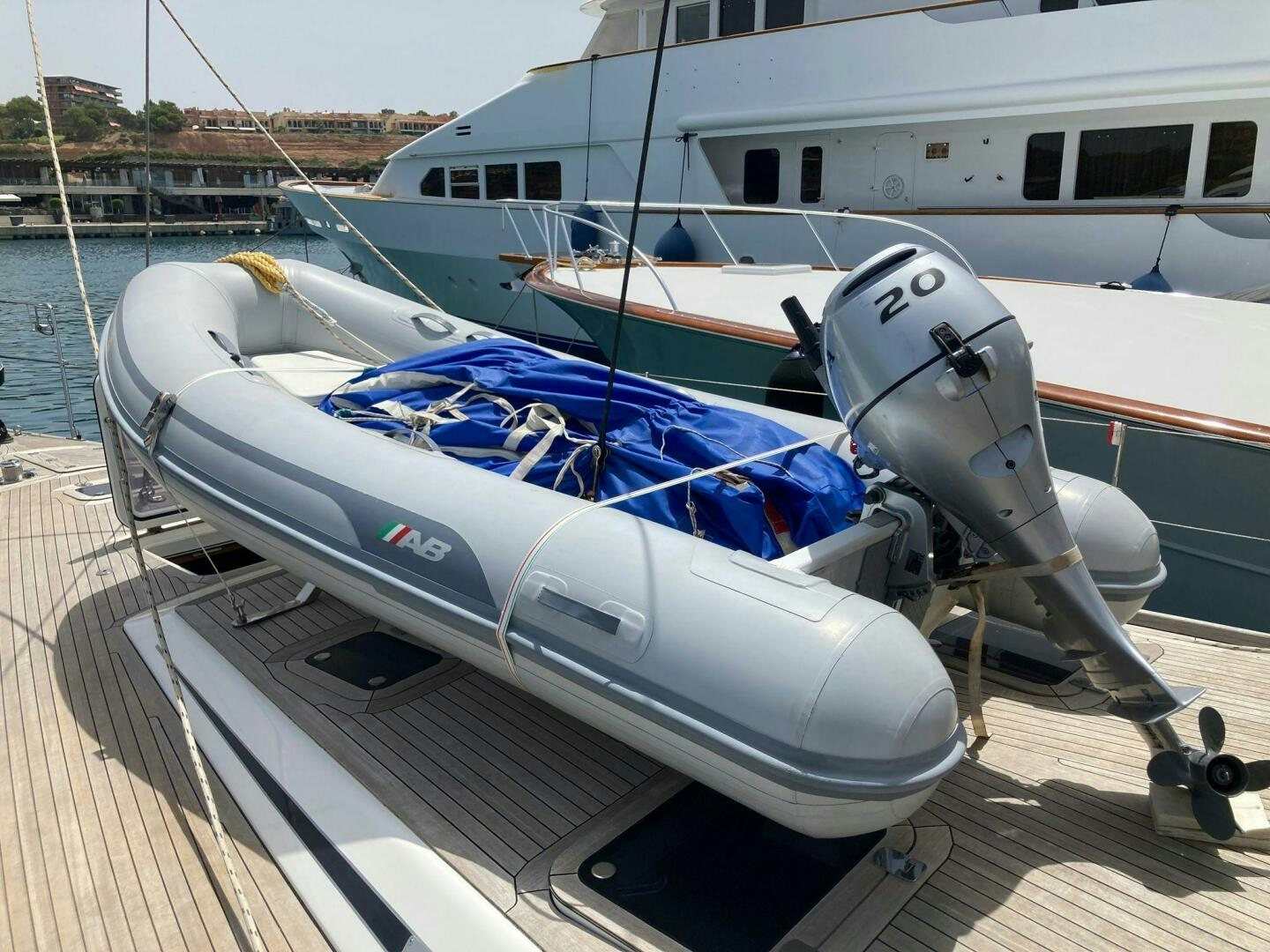 a boat on a dock aboard INDIGO VII Yacht for Sale