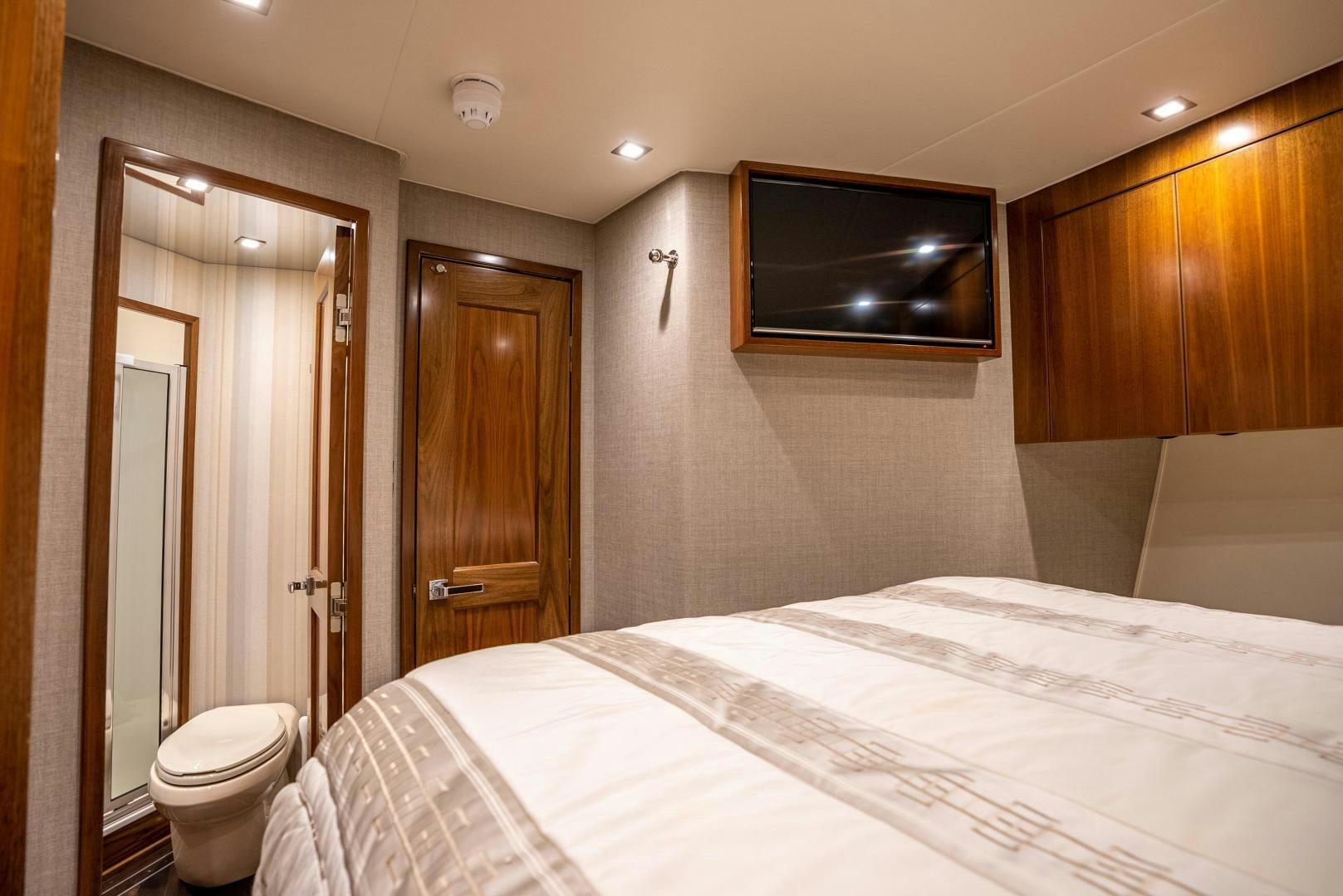 a hotel room with a television aboard Leslie Ann Yacht for Sale