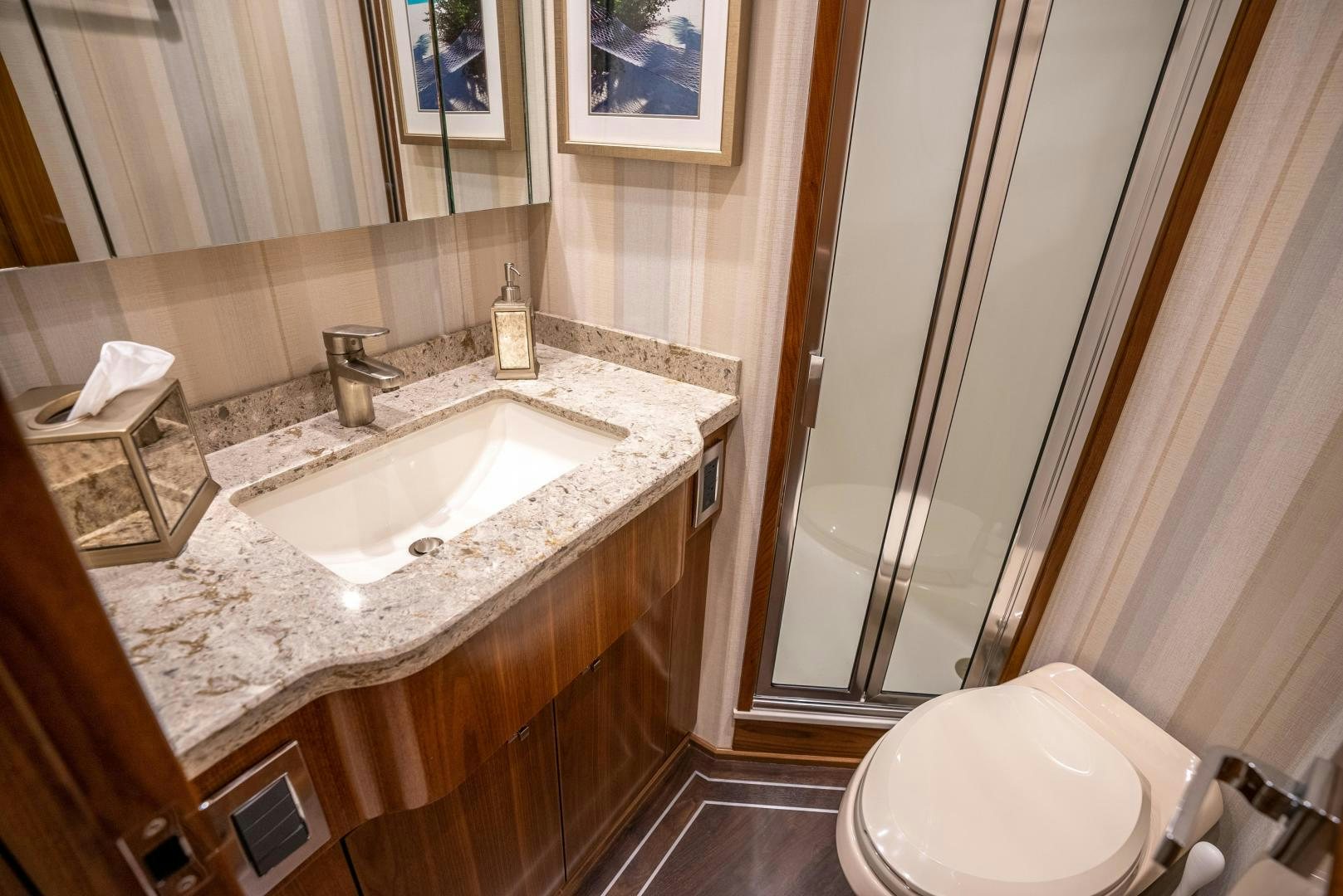 a bathroom with a sink and a toilet aboard Leslie Ann Yacht for Sale