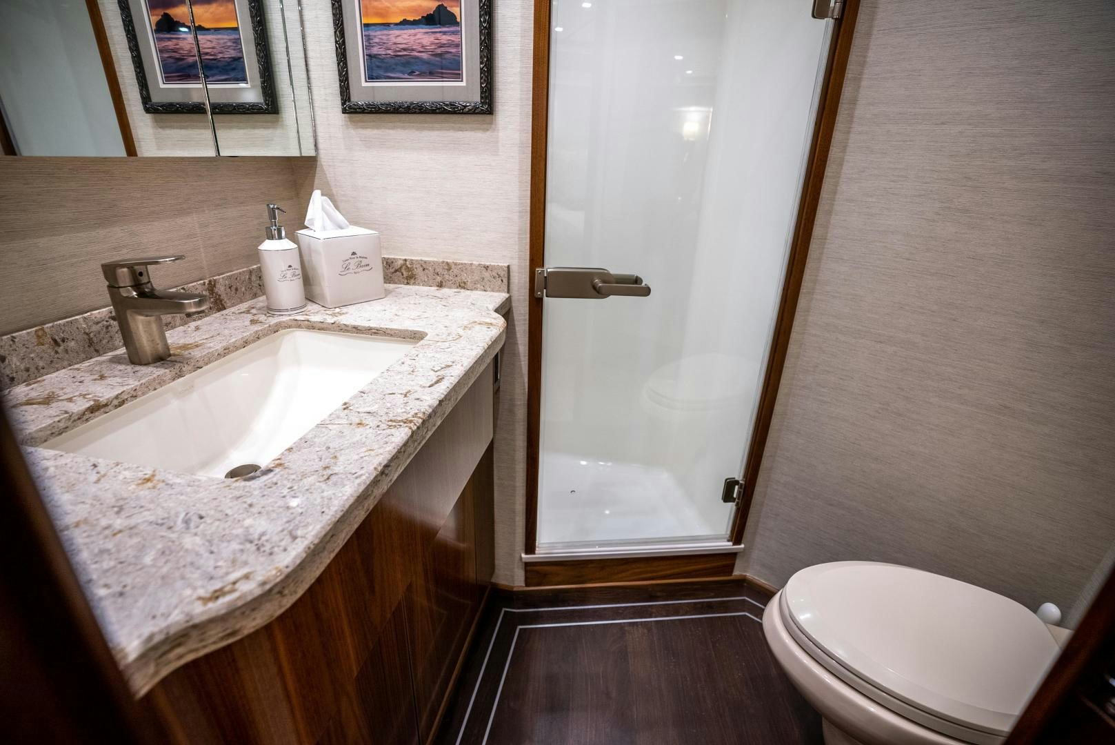 a bathroom with a sink and a toilet aboard Leslie Ann Yacht for Sale