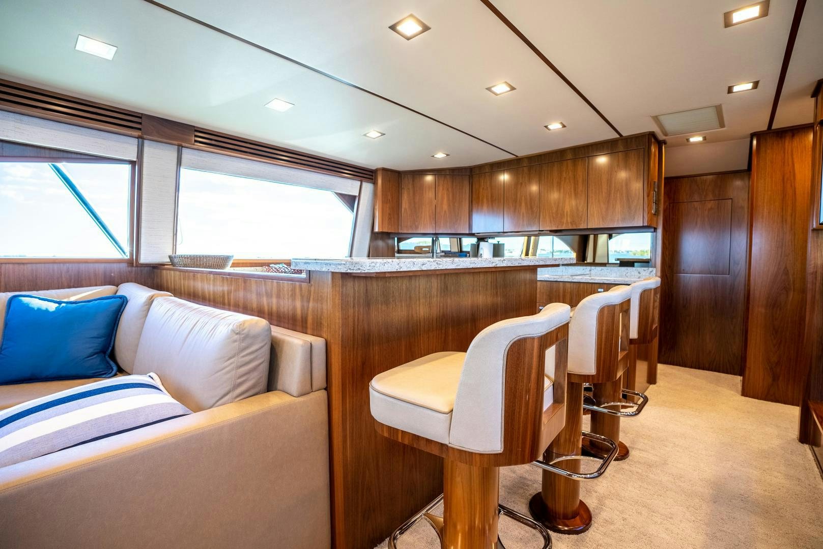 a living room with a couch and a table aboard Leslie Ann Yacht for Sale