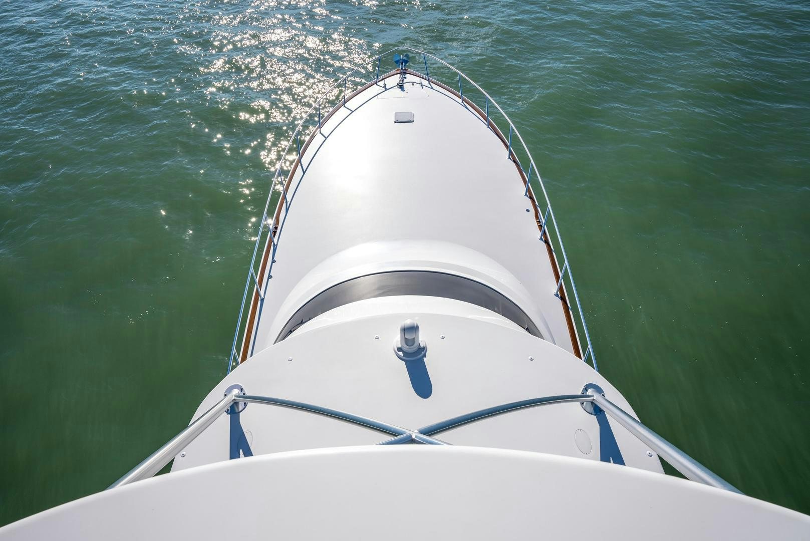 a white boat in the water aboard Leslie Ann Yacht for Sale