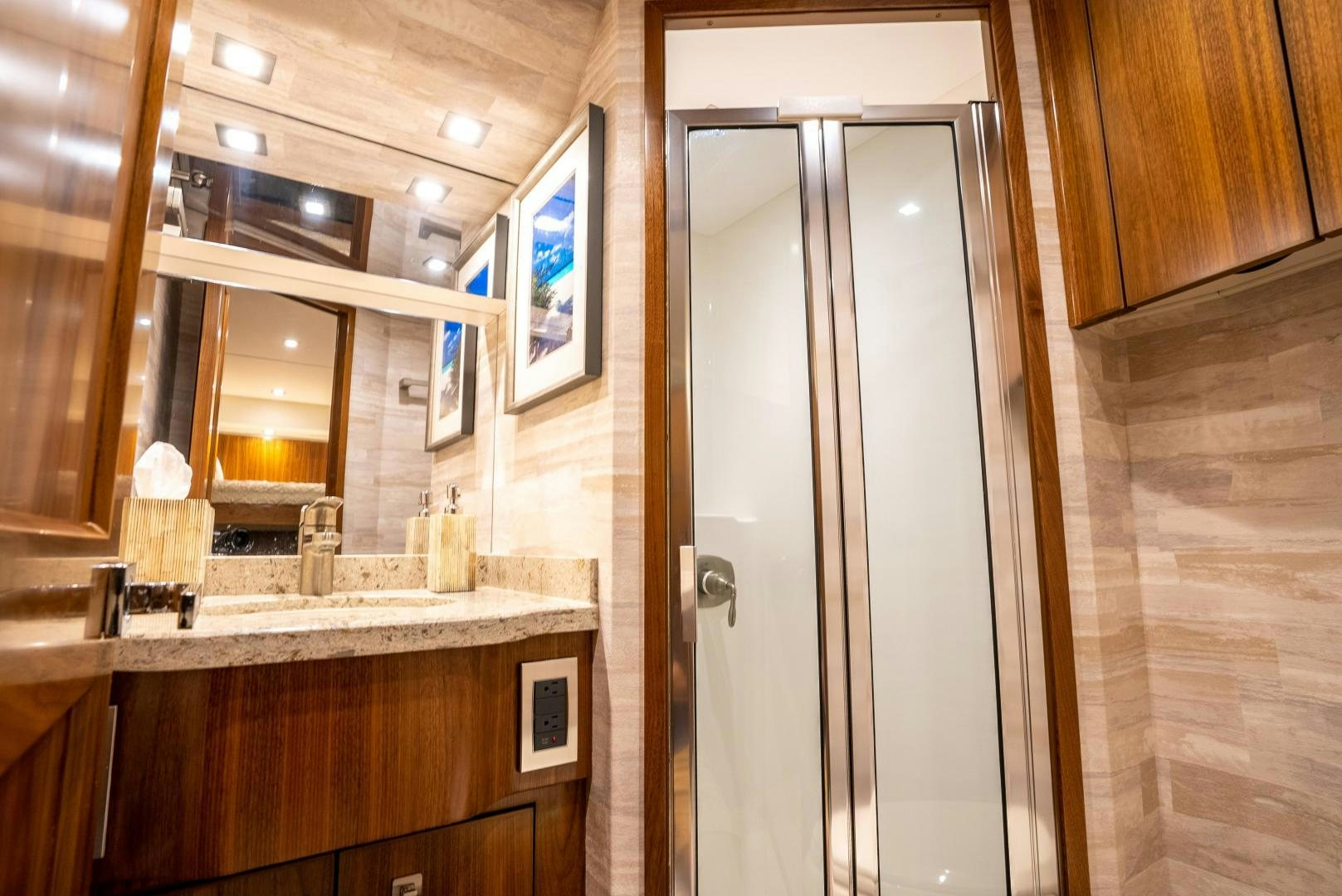 a bathroom with a large shower unit aboard Leslie Ann Yacht for Sale