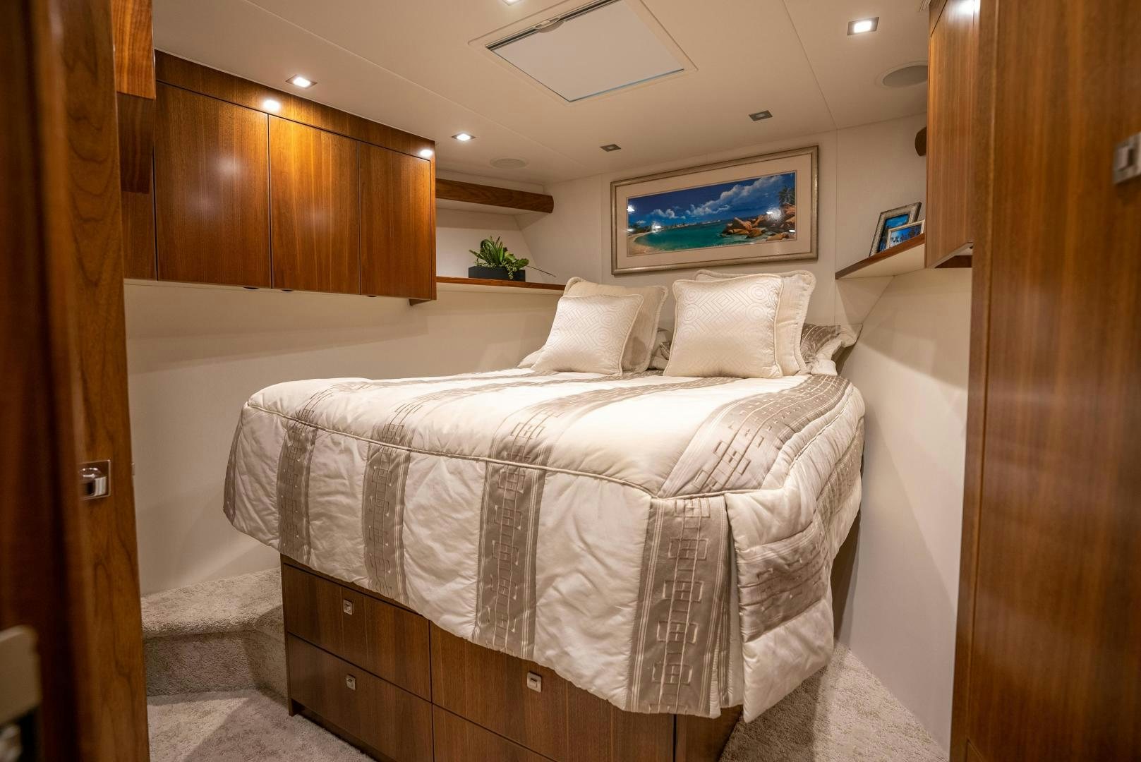 a bed with white sheets aboard Leslie Ann Yacht for Sale