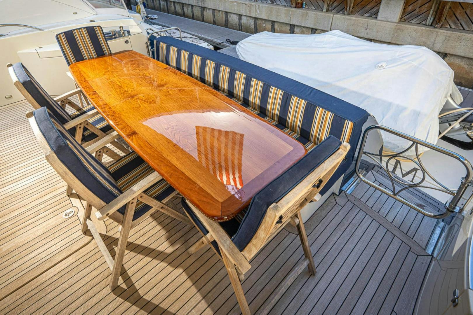 a table on a boat aboard AWAKEN Yacht for Sale