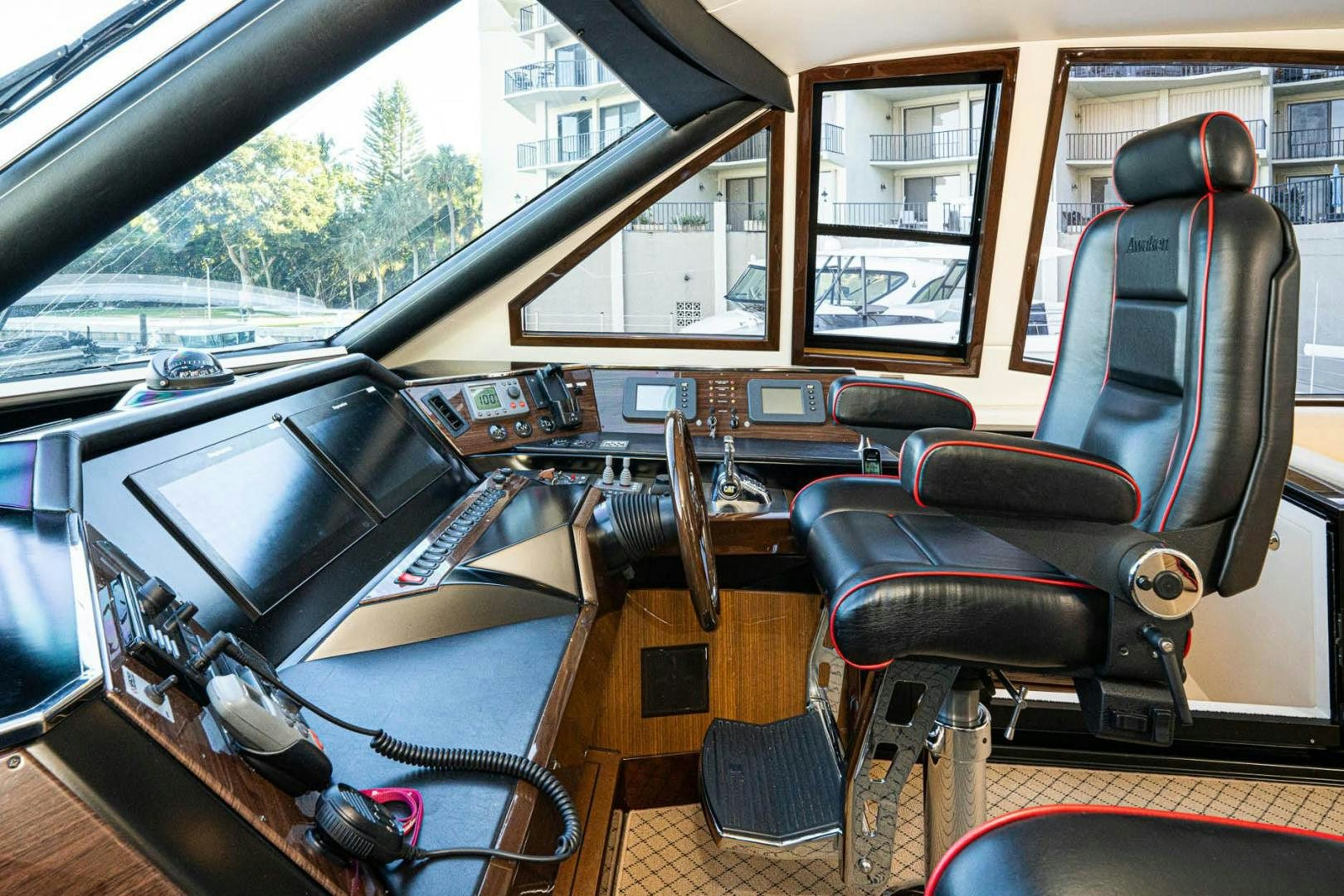 a vehicle with a seat and steering wheel aboard AWAKEN Yacht for Sale