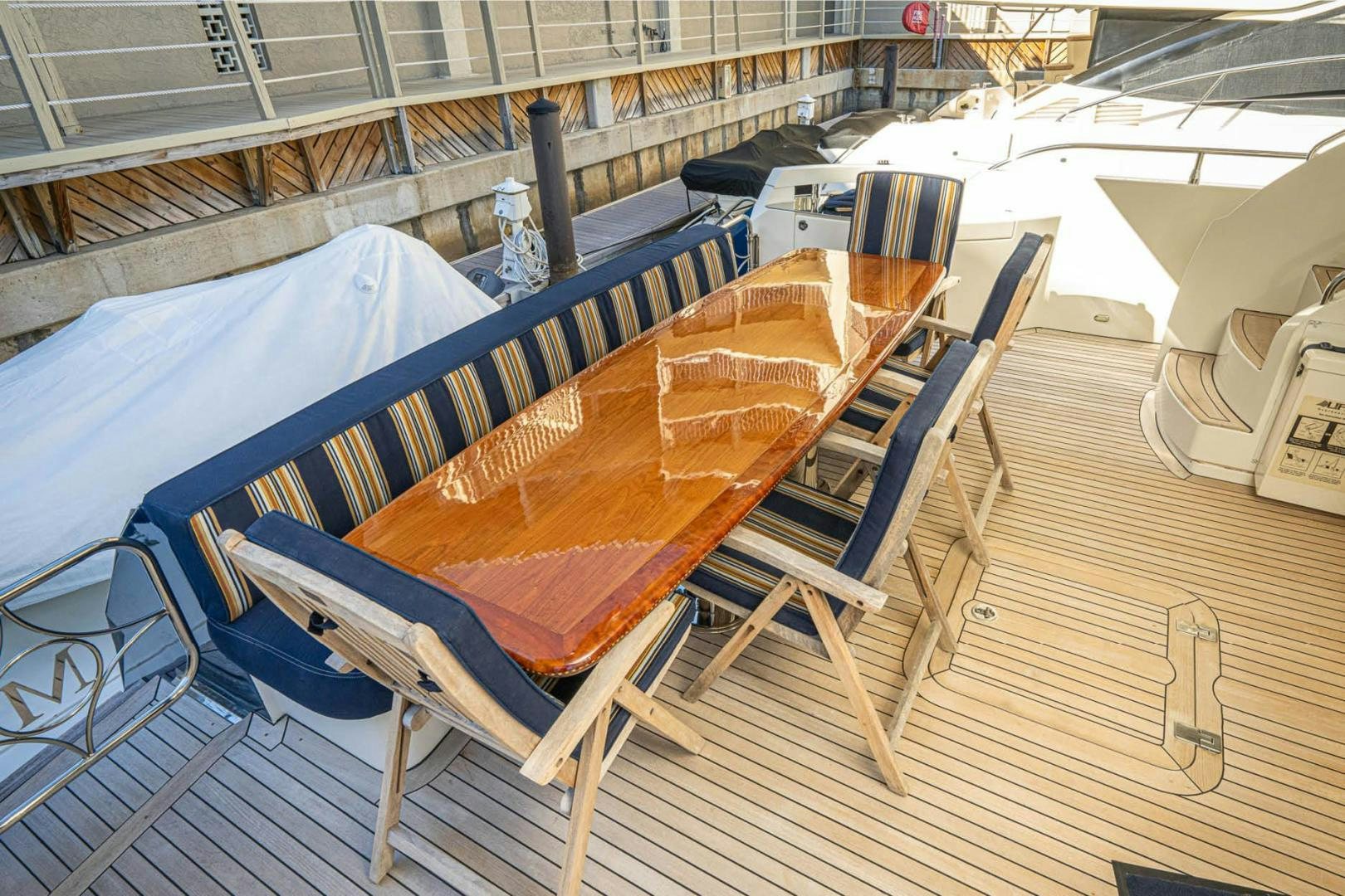 a boat on a deck aboard AWAKEN Yacht for Sale