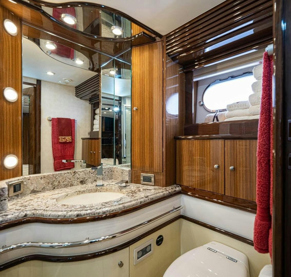a bathroom with a large mirror aboard AWAKEN Yacht for Sale