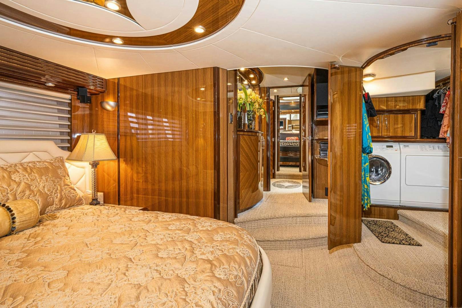 a bedroom with a large bed aboard AWAKEN Yacht for Sale