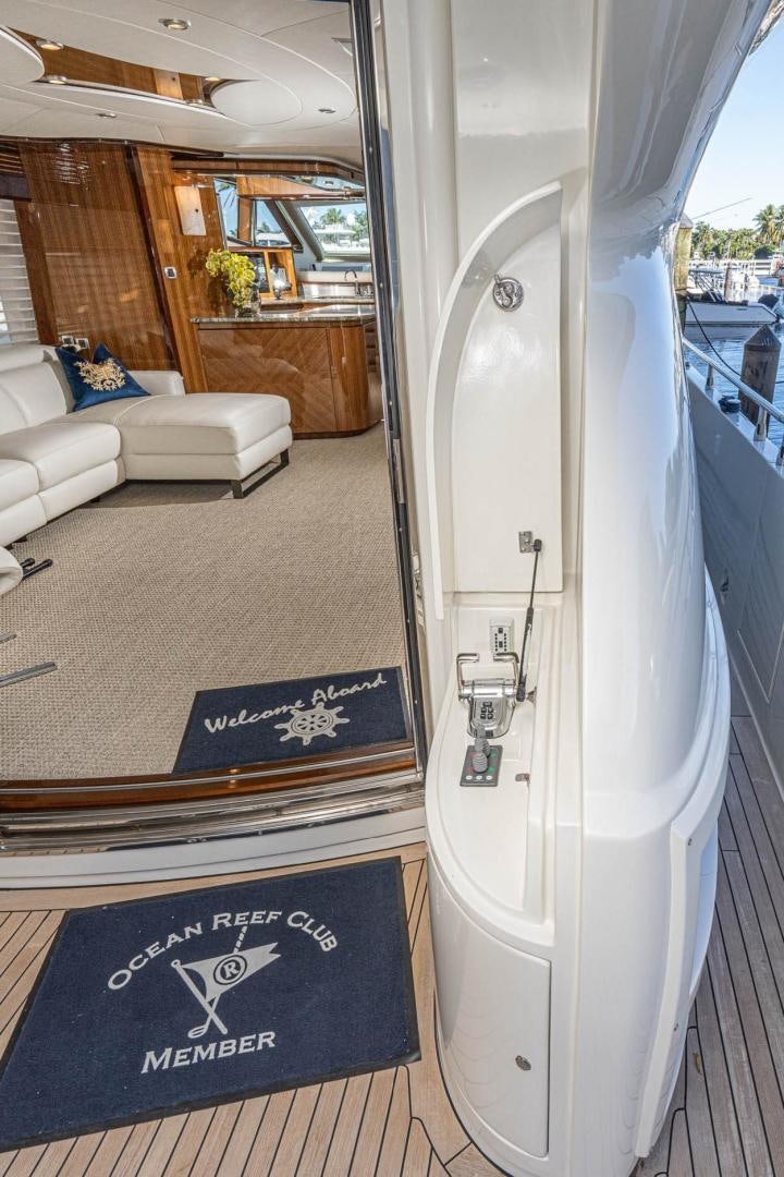 a door with a sign on it aboard AWAKEN Yacht for Sale