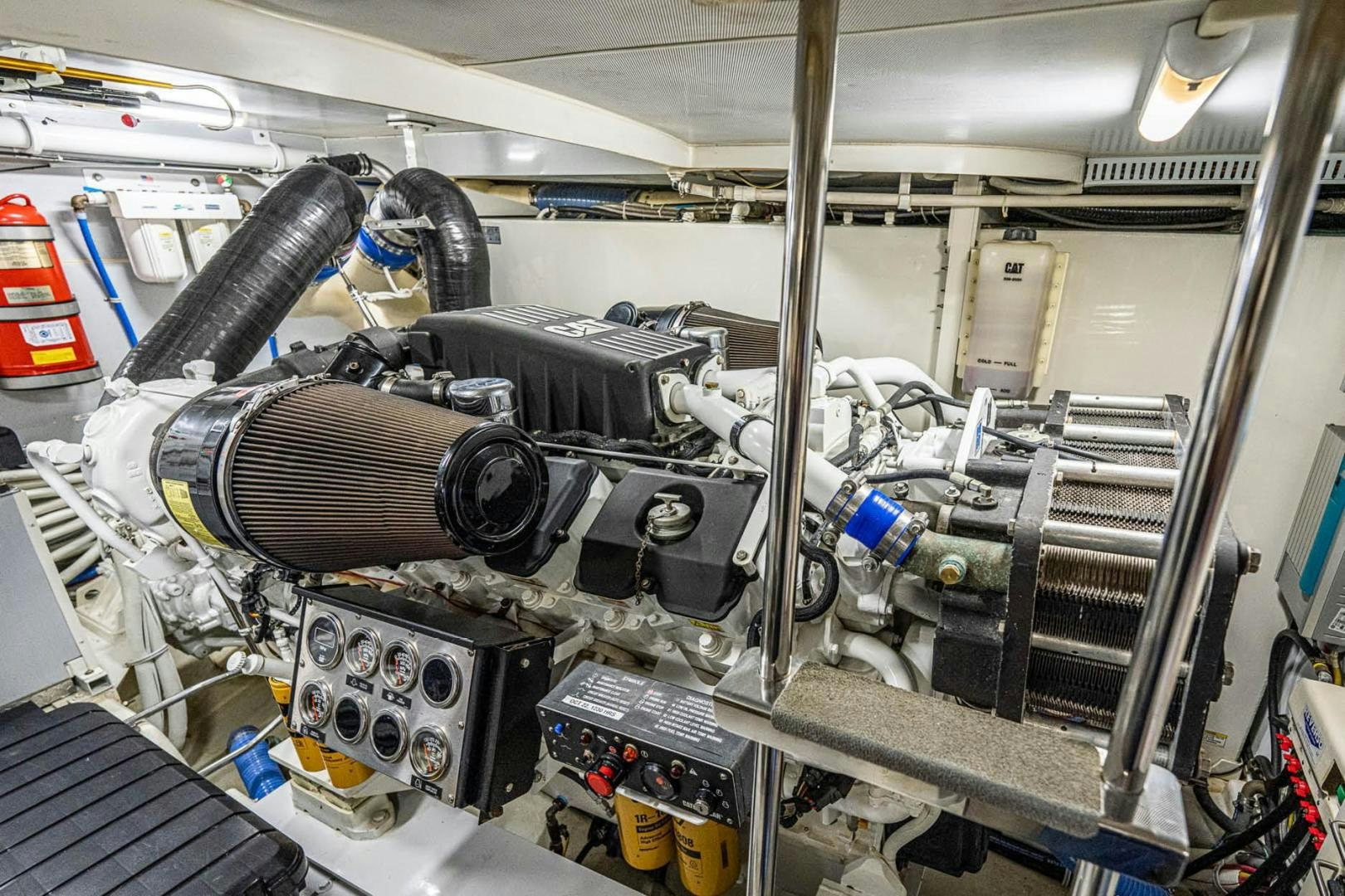 a machine with a large metal cylinder aboard AWAKEN Yacht for Sale