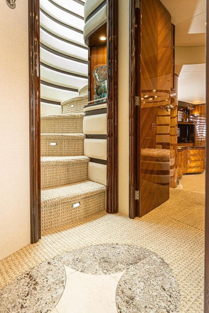 a room with a glass door aboard AWAKEN Yacht for Sale