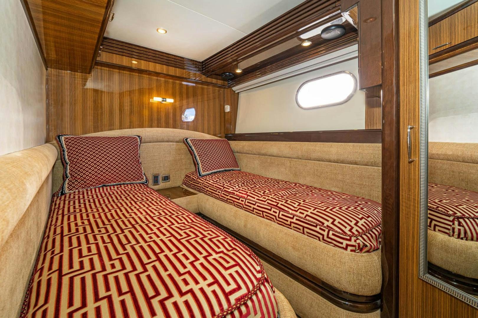 a cabin with a bed aboard AWAKEN Yacht for Sale