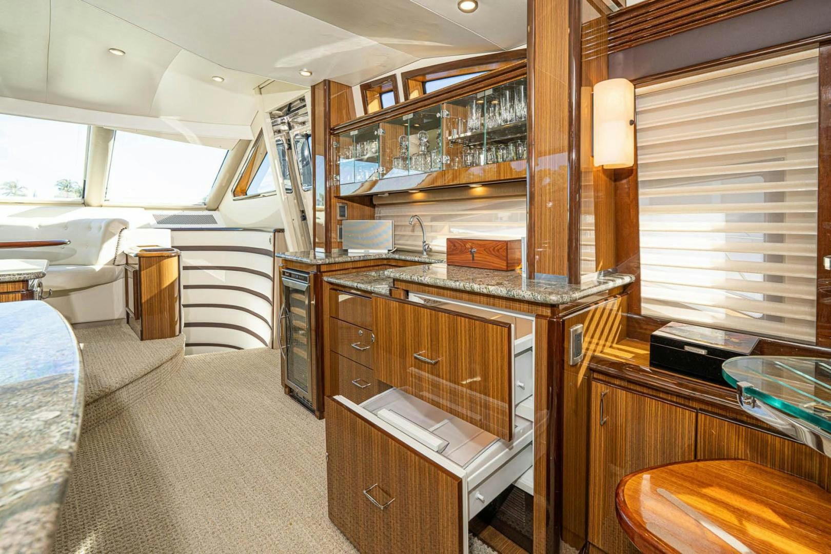 a room with a large shelf aboard AWAKEN Yacht for Sale