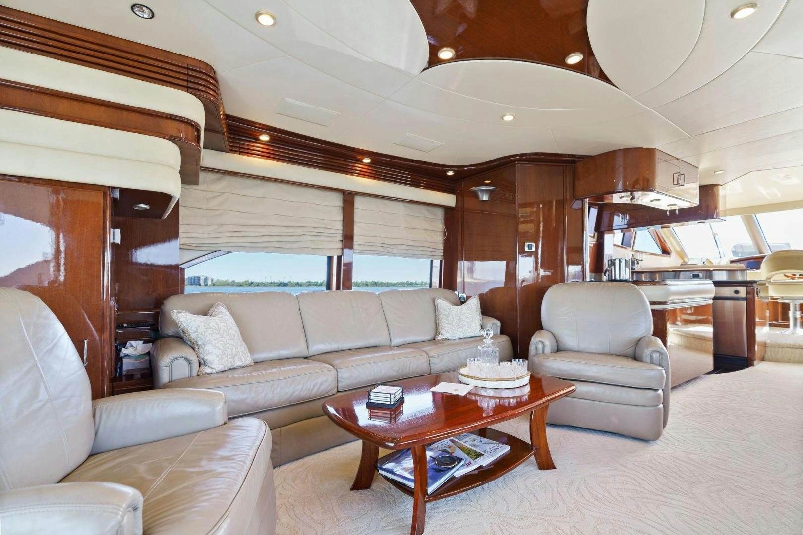 a living room with a large window aboard LA BELLA VITA Yacht for Sale