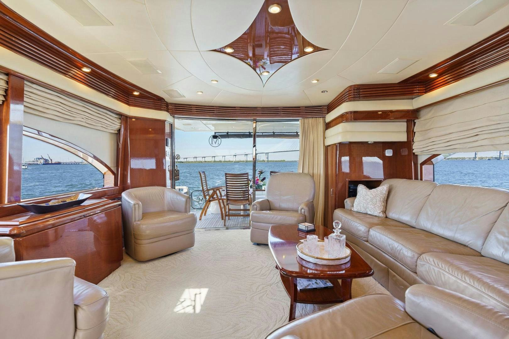 a living room with a large window aboard LA BELLA VITA Yacht for Sale
