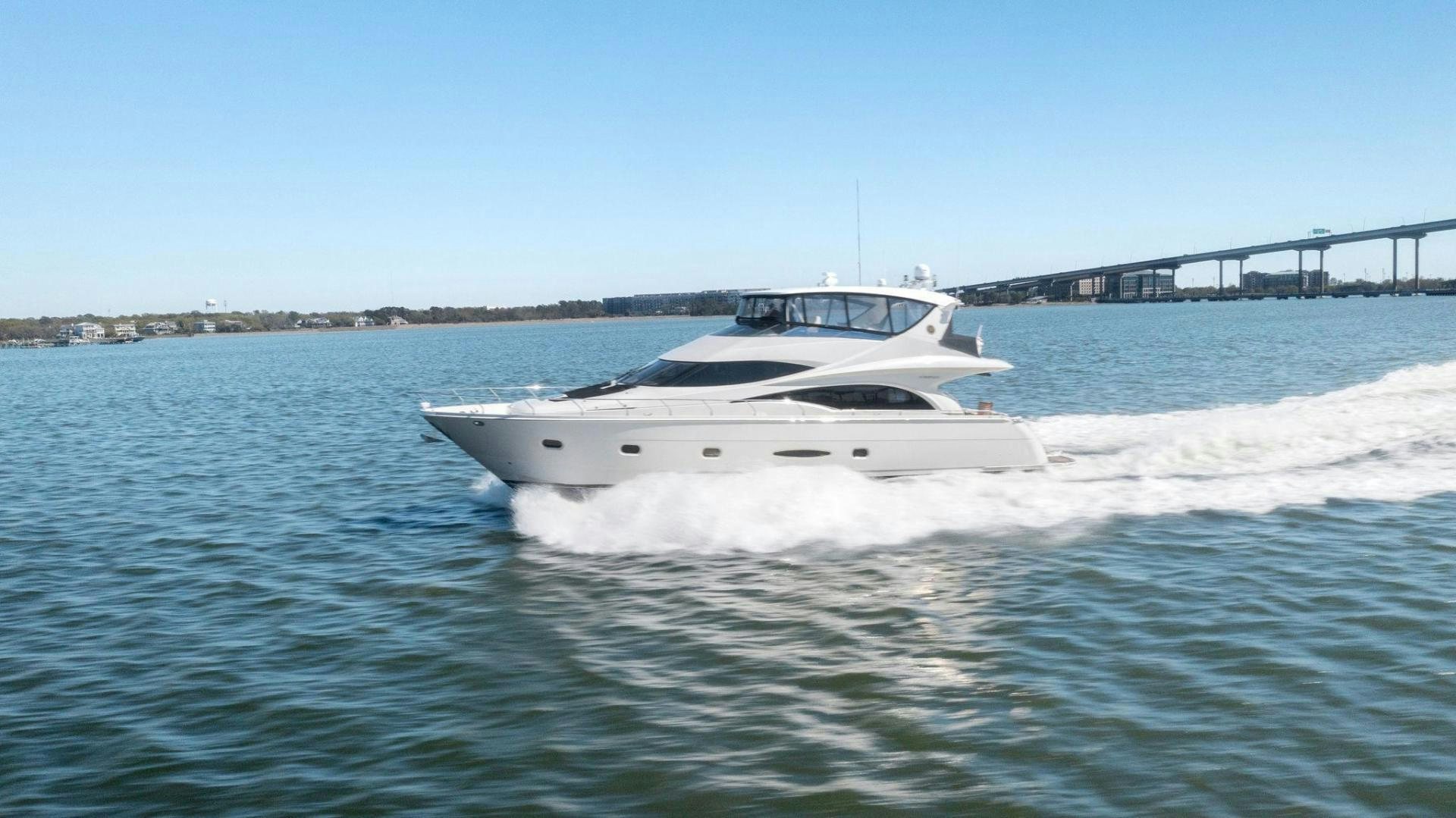a white yacht on the water aboard LA BELLA VITA Yacht for Sale