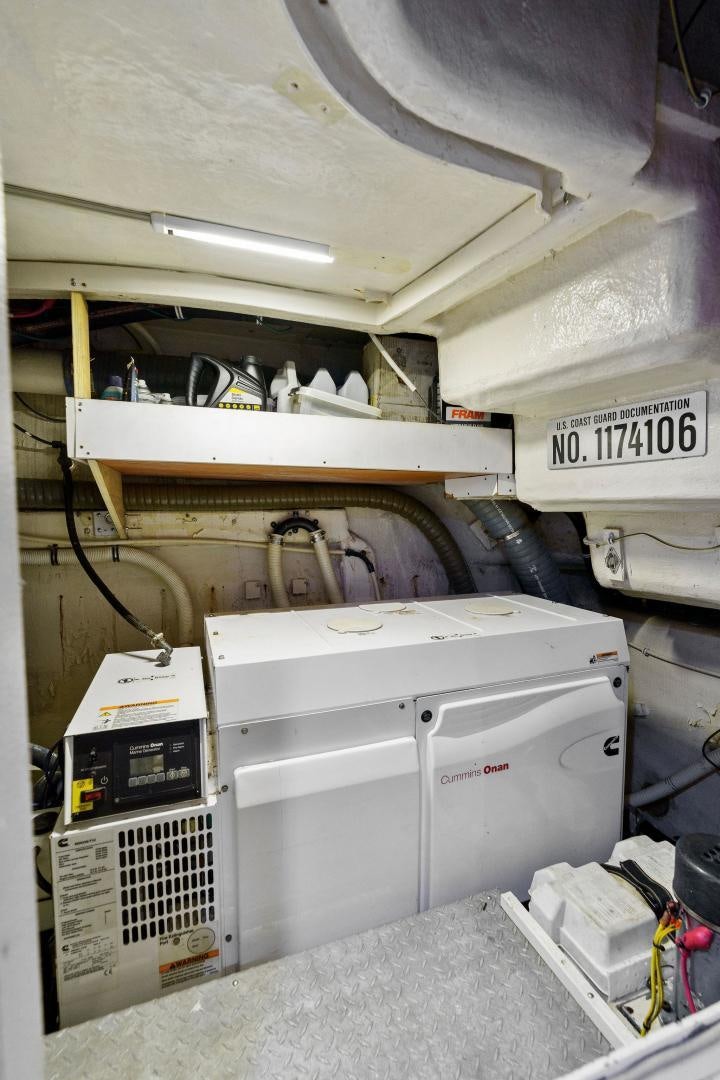 a white machine with a few wires aboard LA BELLA VITA Yacht for Sale