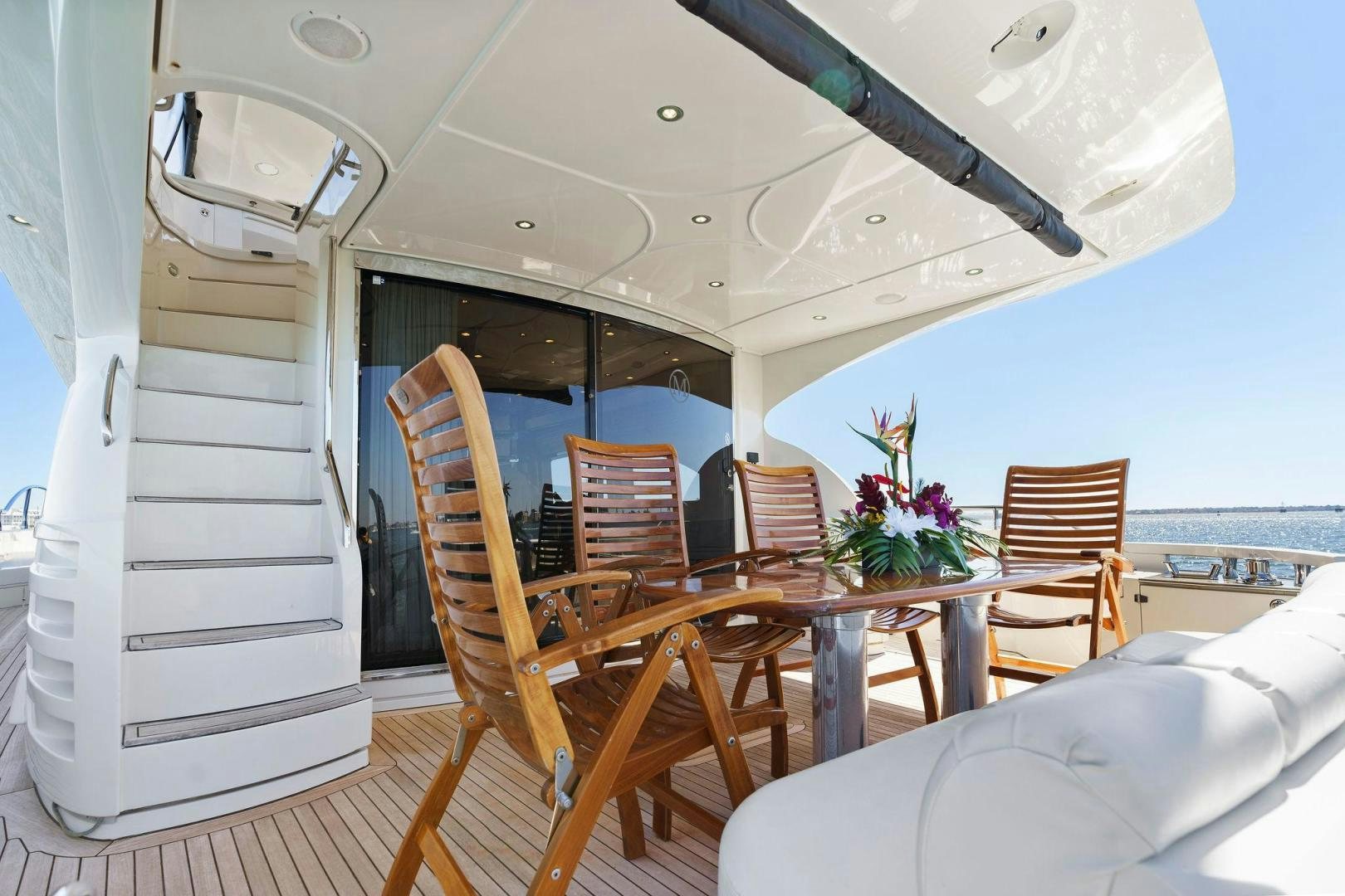 a boat with a ladder on the deck aboard LA BELLA VITA Yacht for Sale