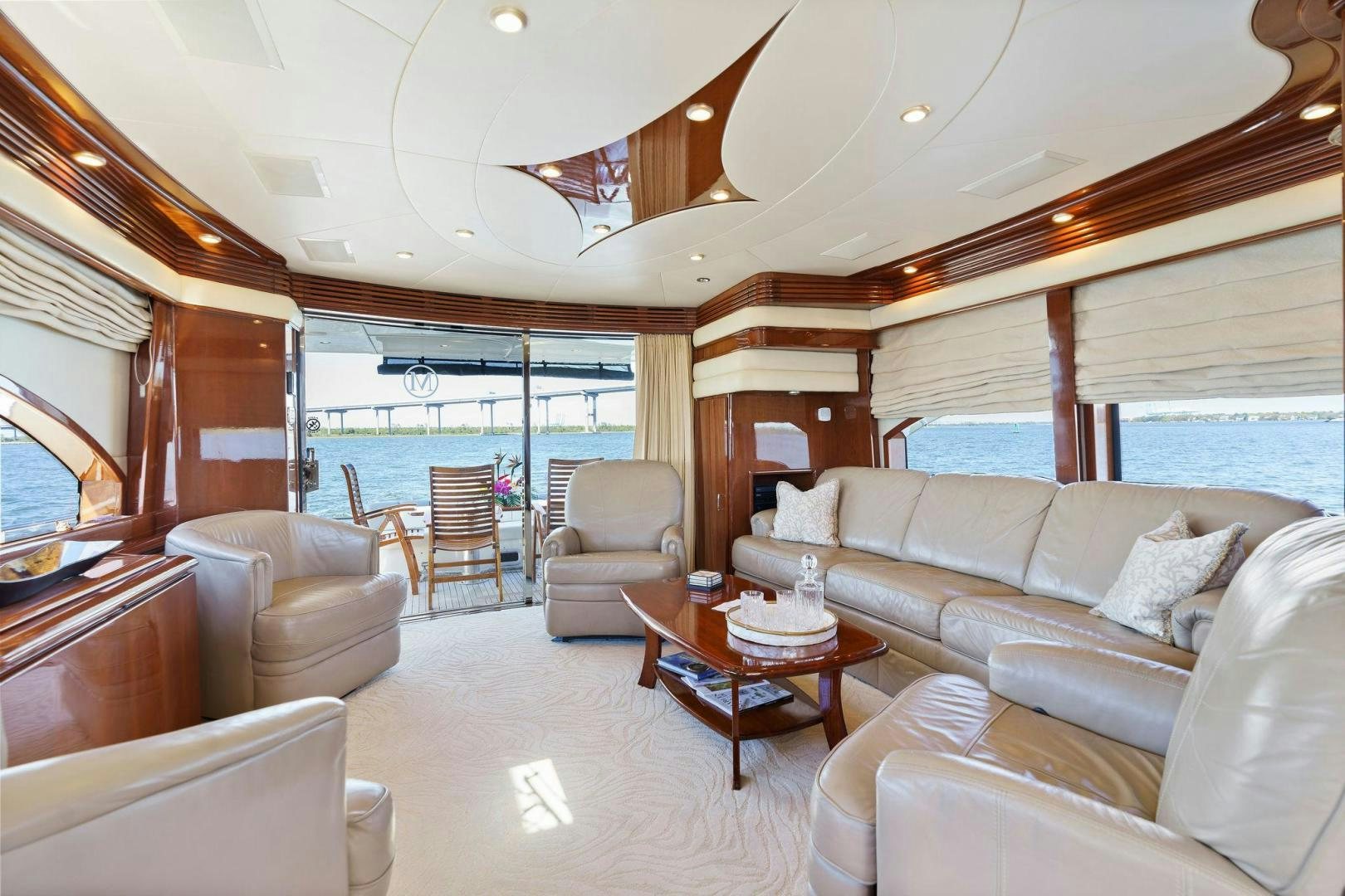 a living room with a large window aboard LA BELLA VITA Yacht for Sale