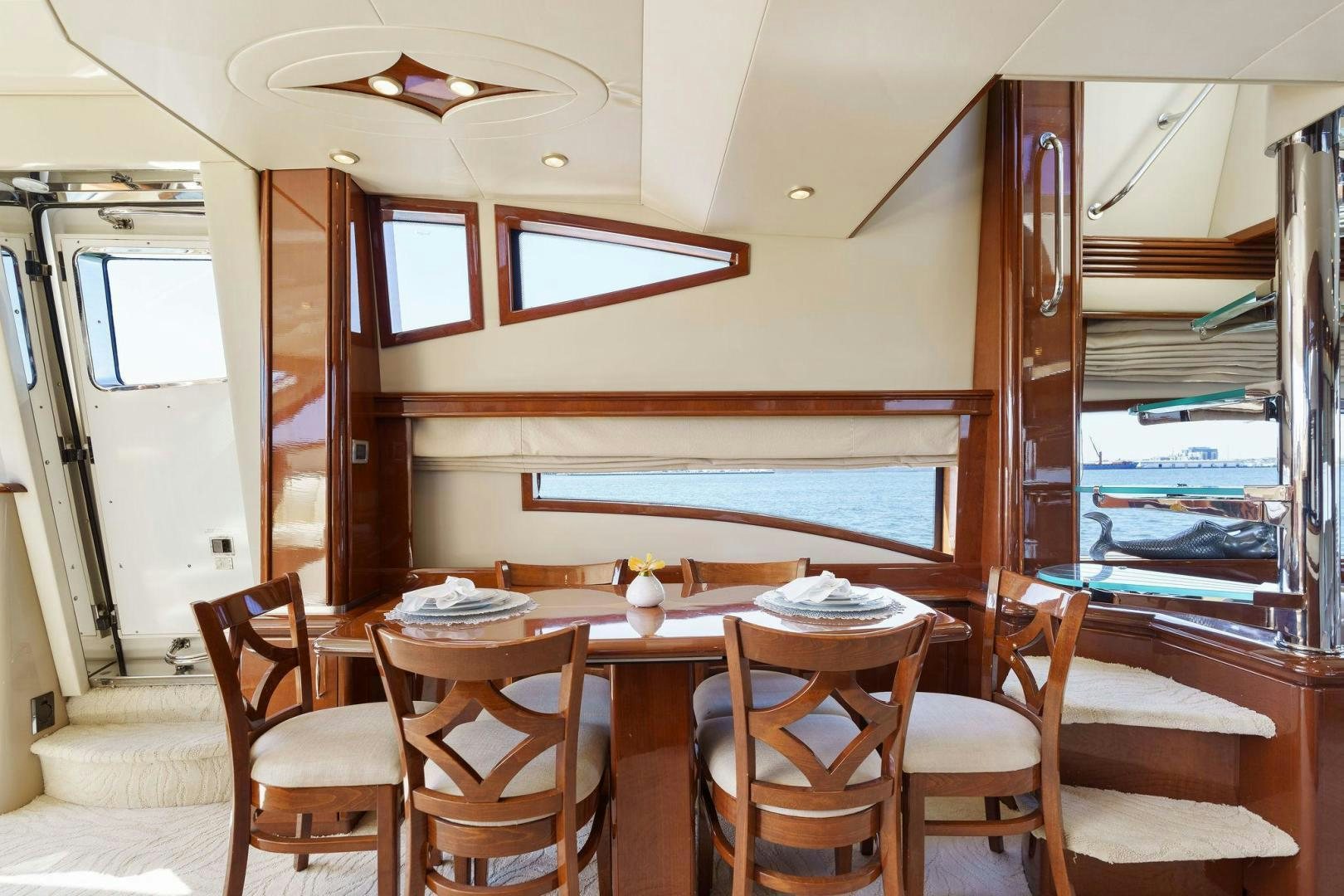 a dining table in a cabin aboard LA BELLA VITA Yacht for Sale