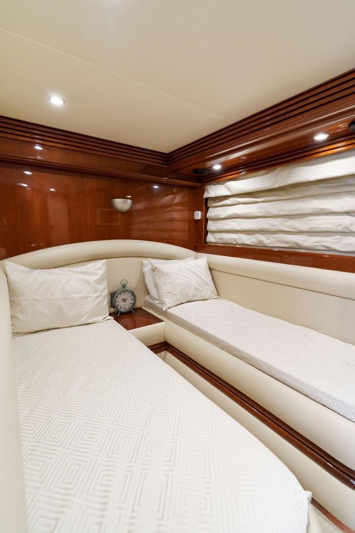 a couple of beds in a room aboard LA BELLA VITA Yacht for Sale