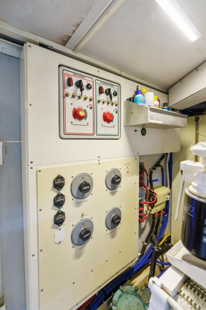 a white machine with buttons and a picture on it aboard LA BELLA VITA Yacht for Sale