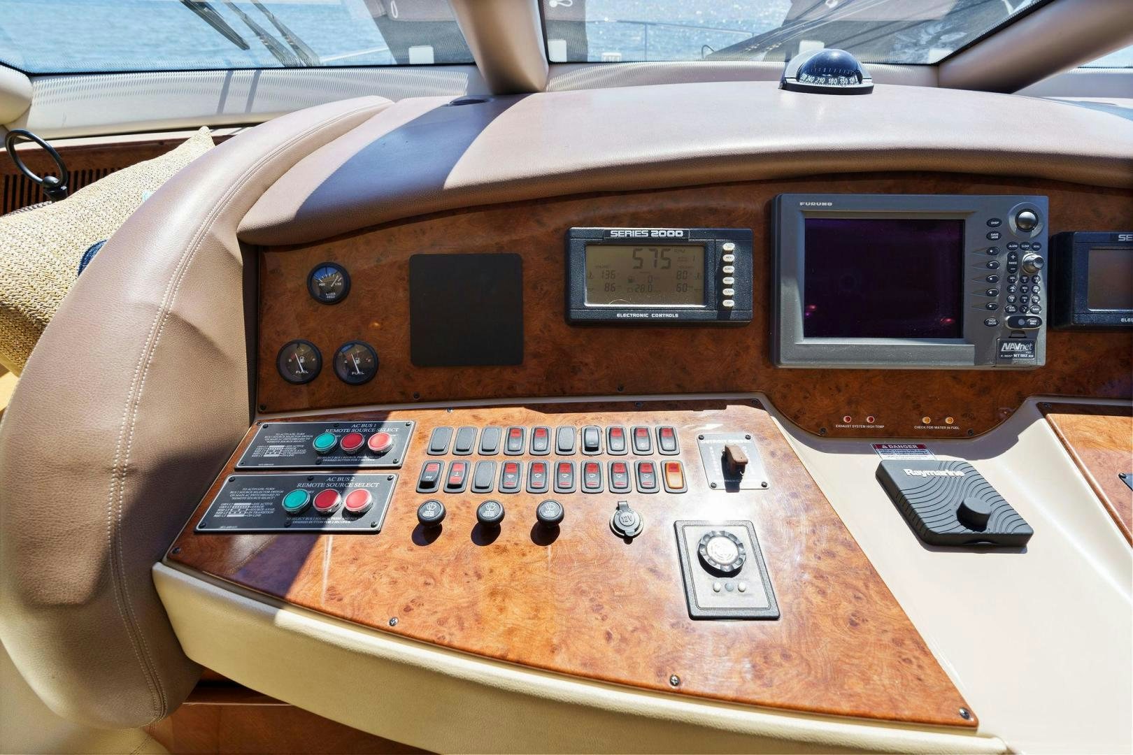 the back of a brown leather car aboard LA BELLA VITA Yacht for Sale