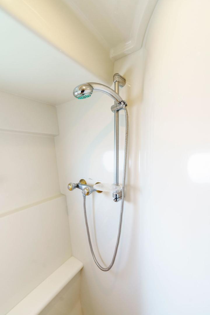 a shower head with a clear glass aboard LA BELLA VITA Yacht for Sale
