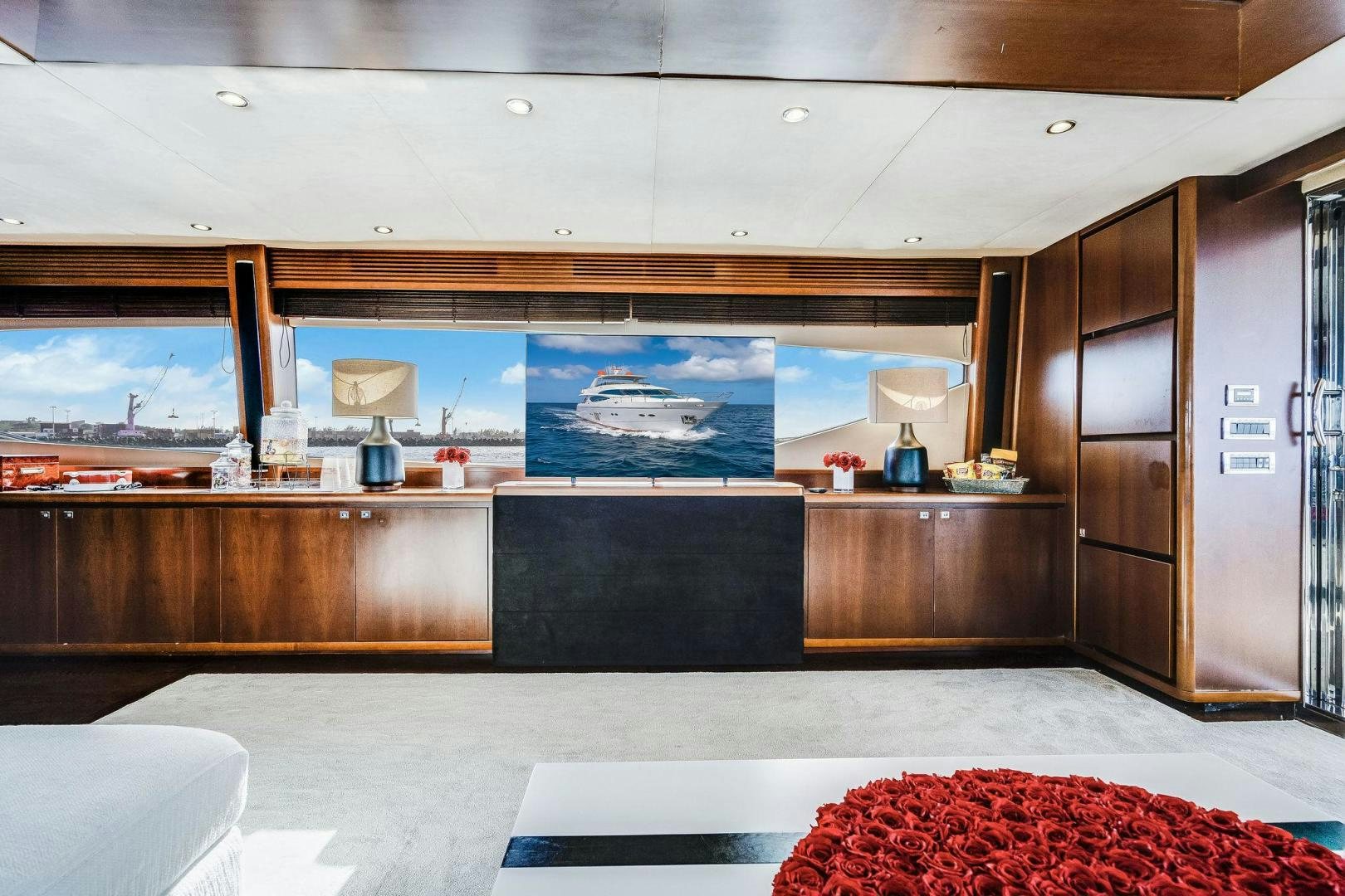 a room with a large screen aboard 21 SEA SANDS Yacht for Sale