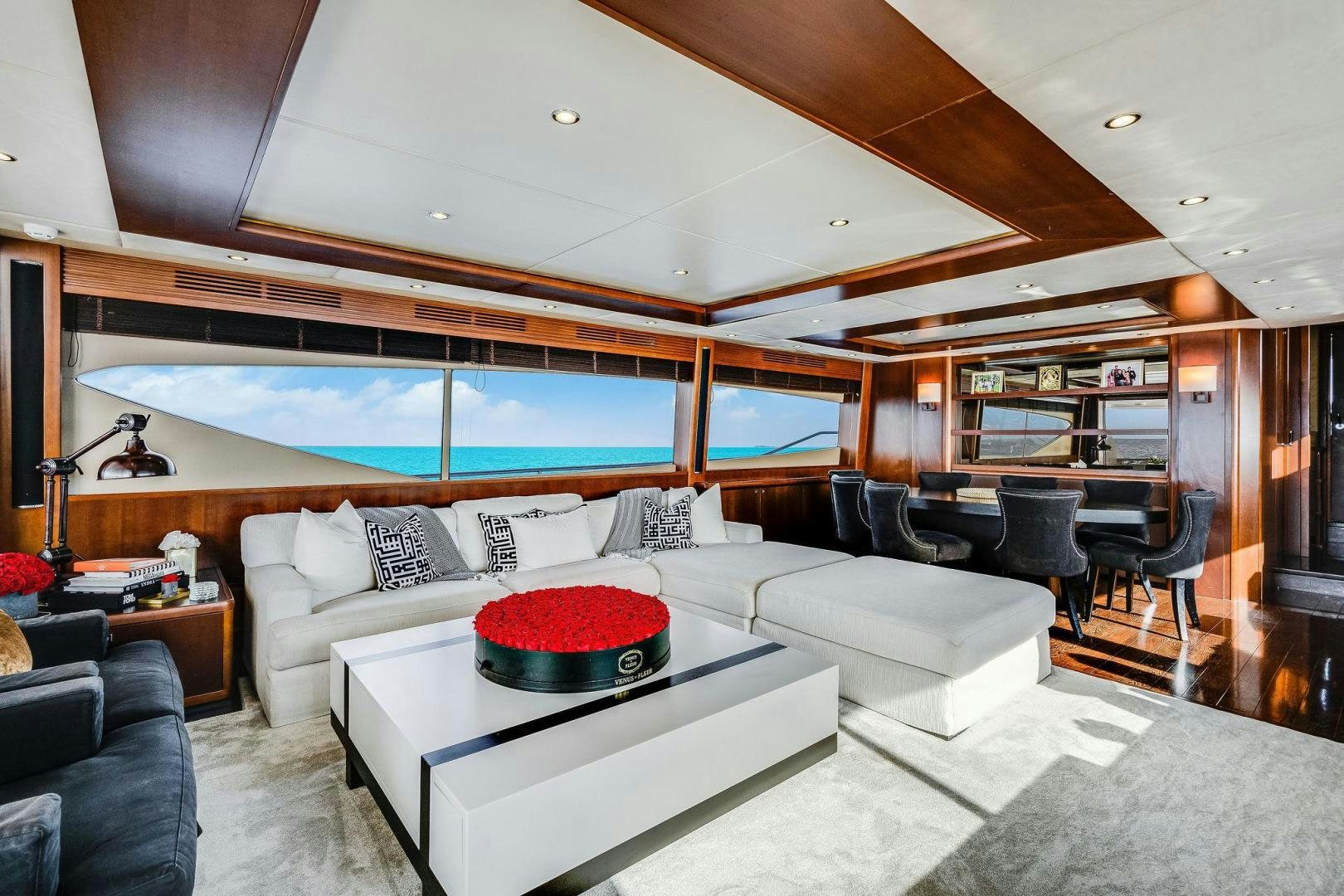 a living room with a large screen aboard 21 SEA SANDS Yacht for Sale